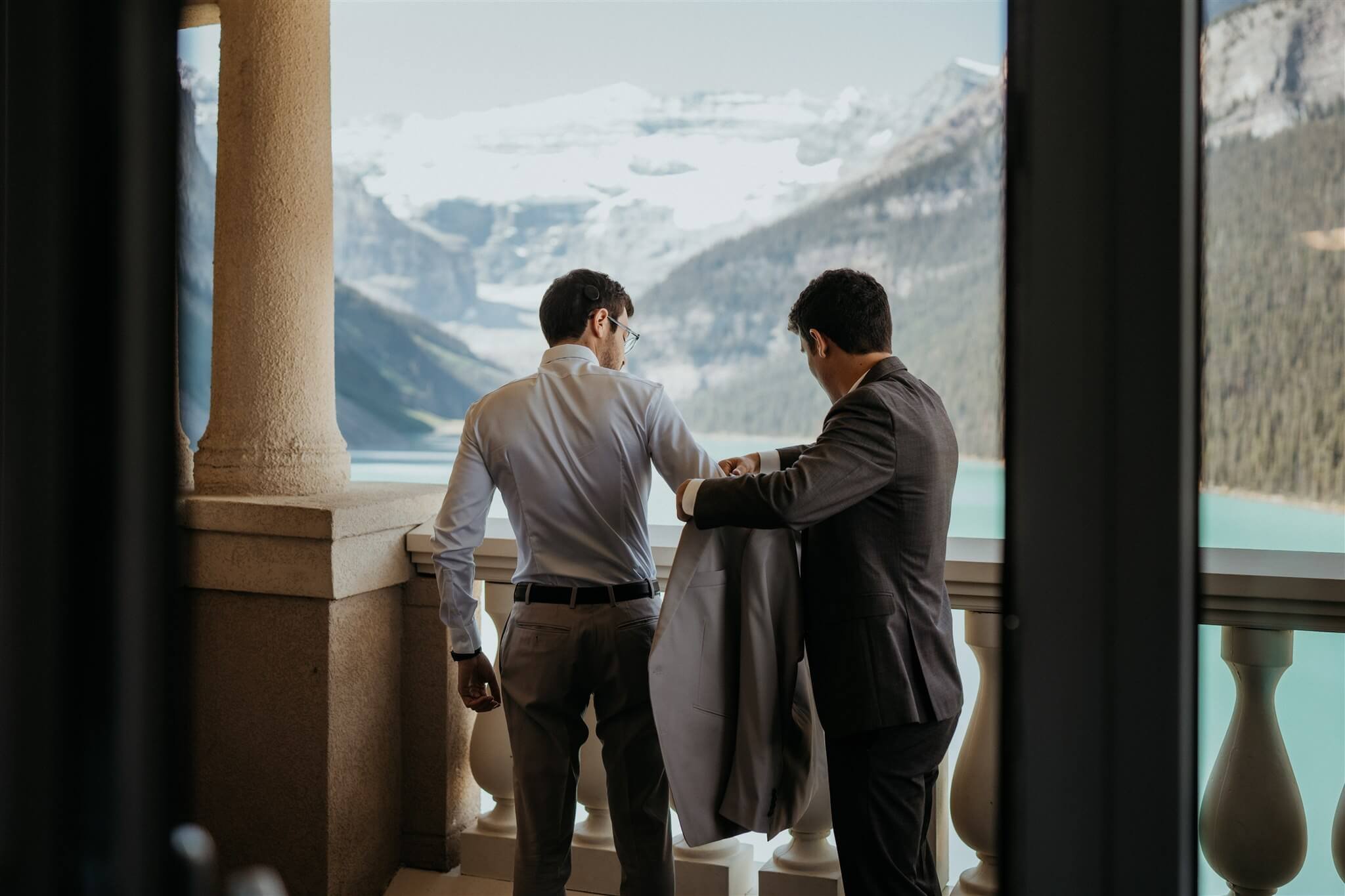Groom getting ready for Lake Louise wedding at the Fairmont Chateau hotel