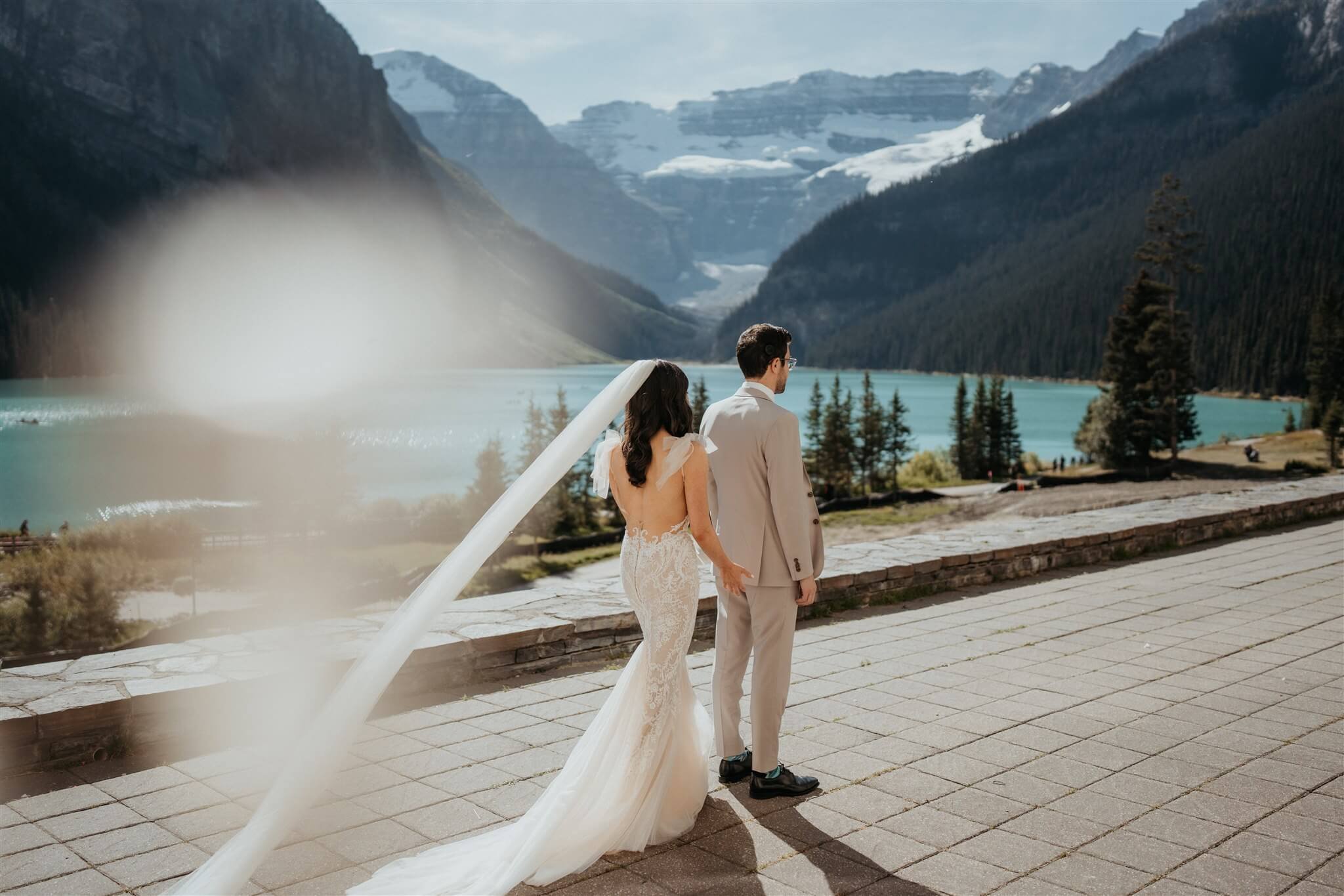 Bride and groom first look outside the Fairmont Chateau Lake Louise 