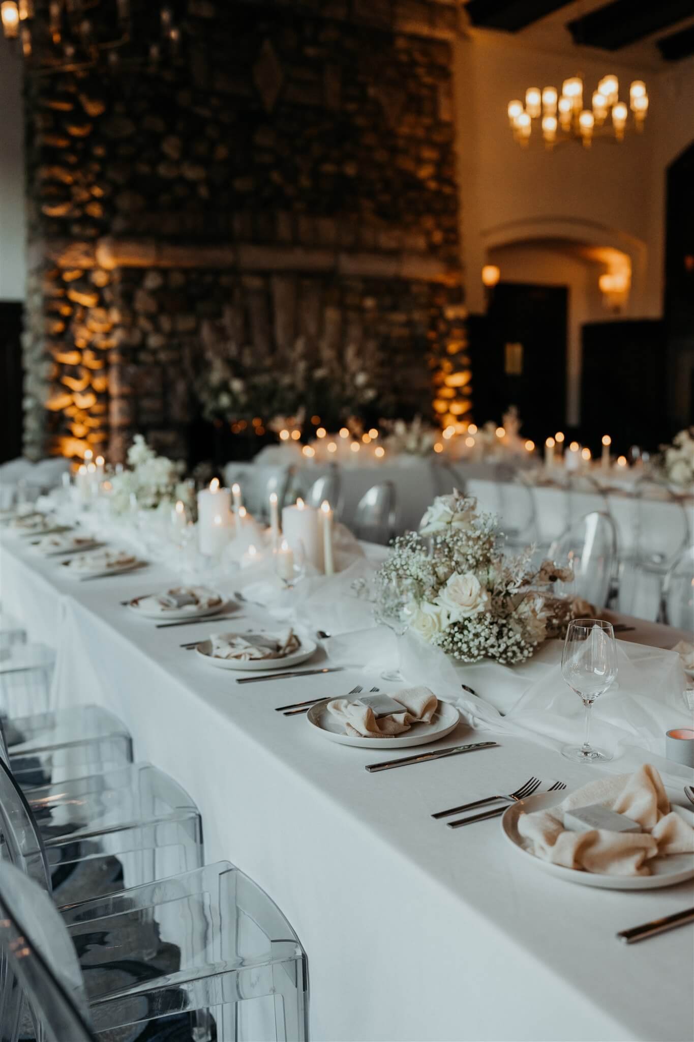 White and gold wedding decorations on reception tables