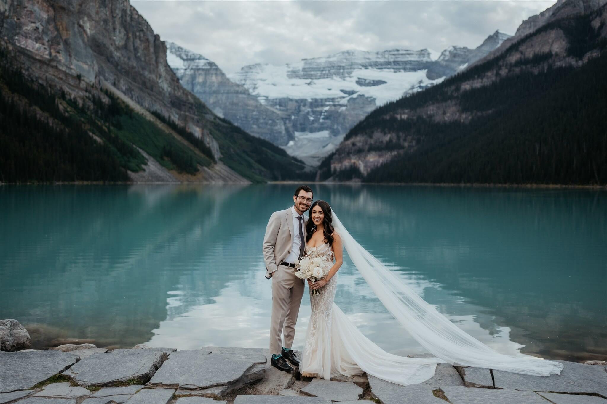 Bride and groom couple portraits at luxury venue at Lake Louise