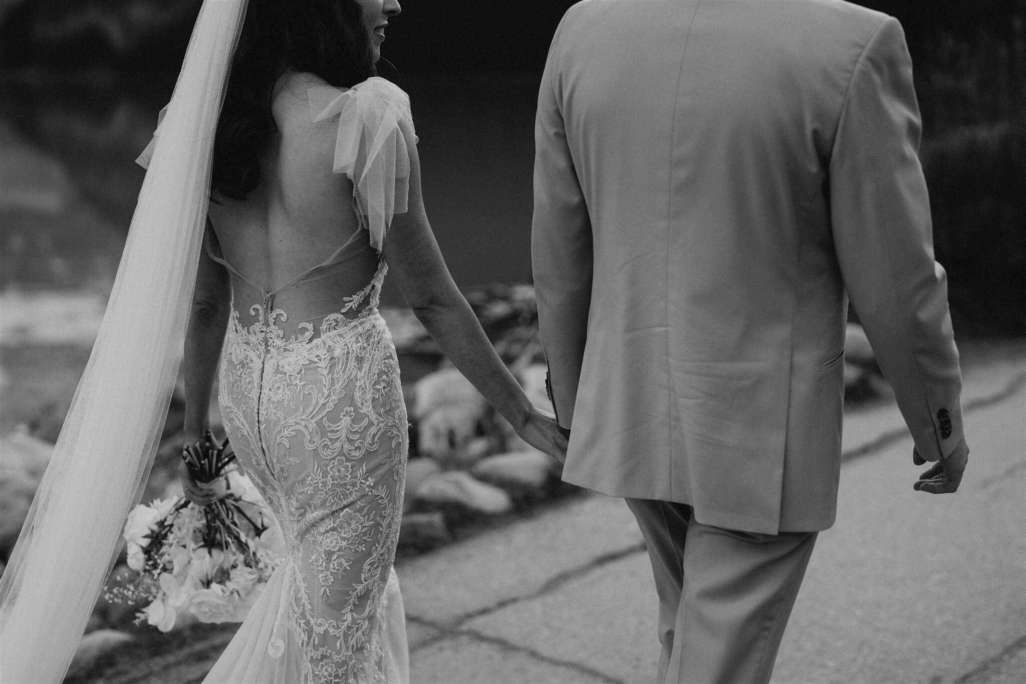 Bride and groom outdoor couple portraits at luxury venue at Lake Louise