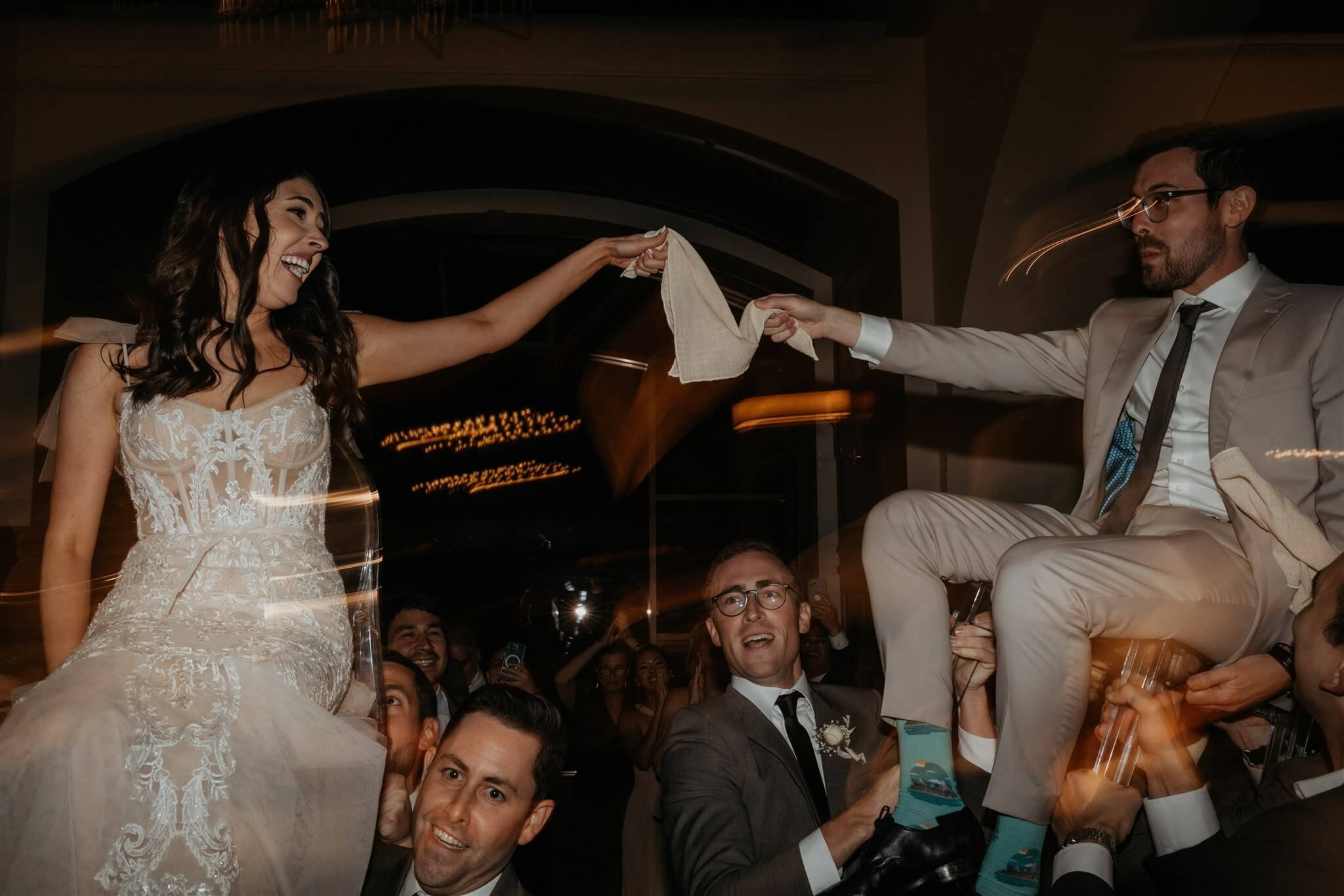 Bride and groom do the Horah Dance at Fairmont Chateau Lake Louise wedding