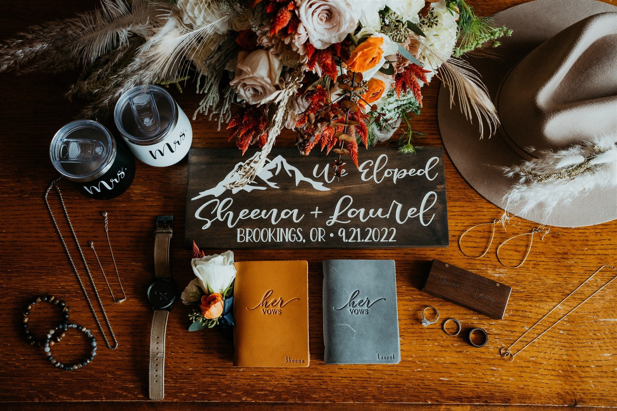 Fall elopement details with leather wrapped hers and hers vow books