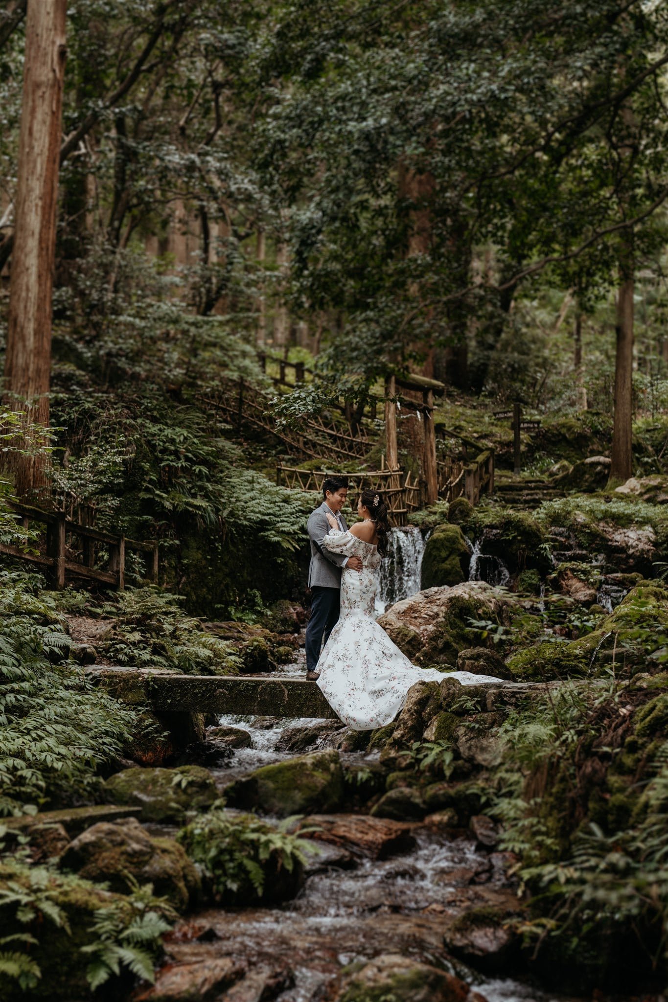 Bride and groom elopement portraits in the forest in Japan