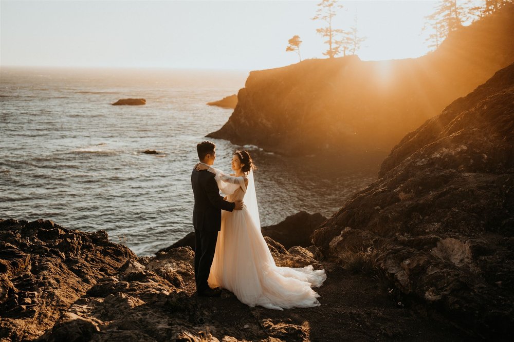 Bride and groom sunset portraits on the Oregon Coast