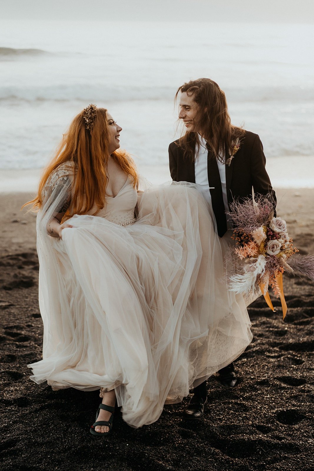 Bride and groom sunset portraits at Rialto Beach