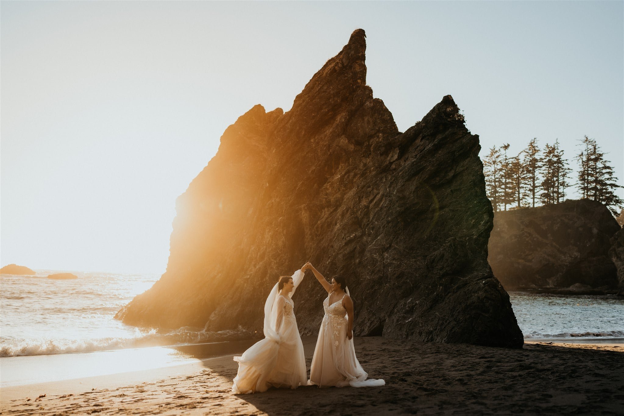 Sunset bridal portraits on the beach during elopement at Secret Beach, Oregon