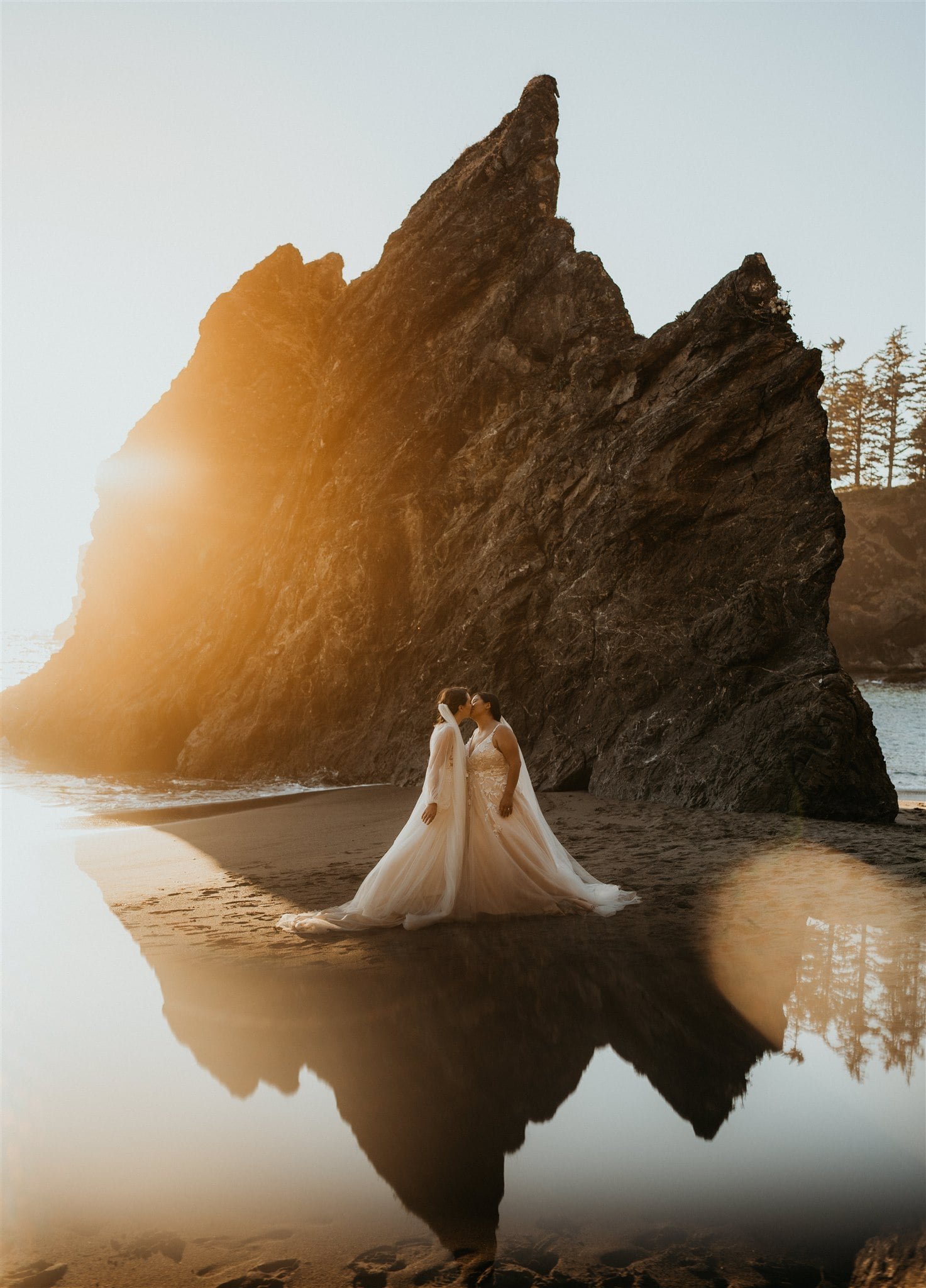 Sunset bridal portraits on the beach during elopement at Secret Beach, Oregon