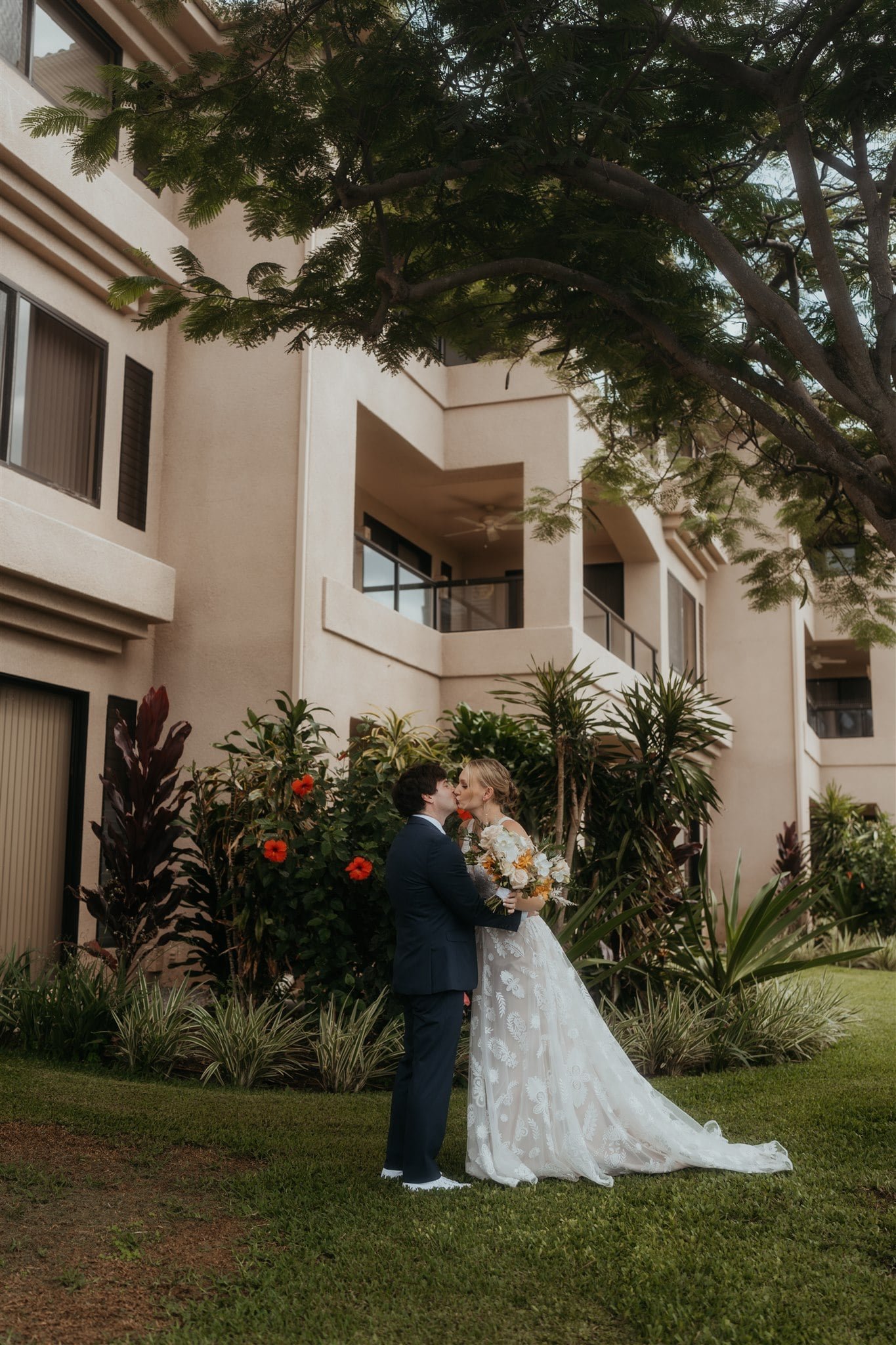 Bride and groom kiss after their wedding first look on the Big Island