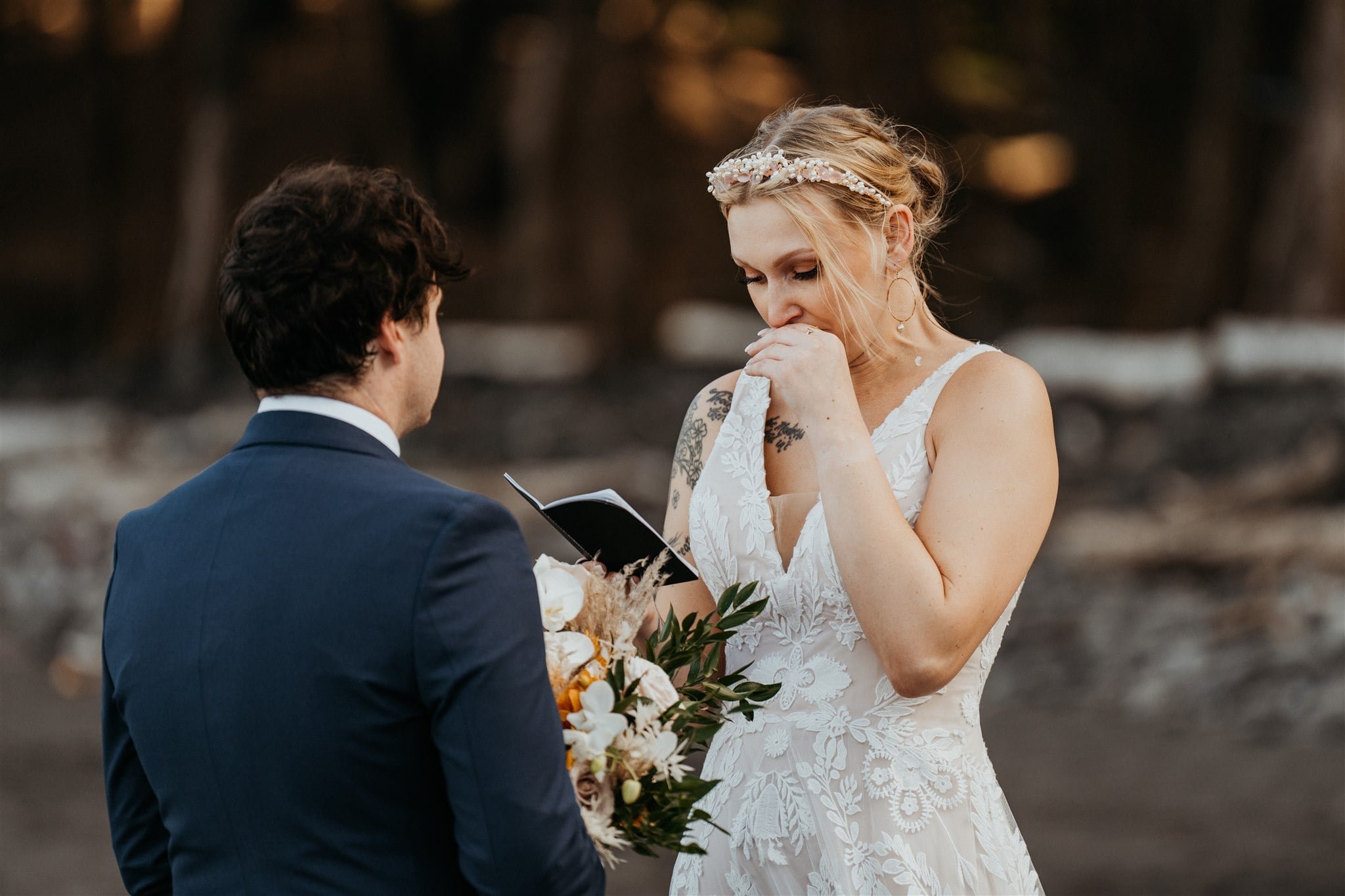 Bride gets emotional while reading vows during elopement on the Big Island