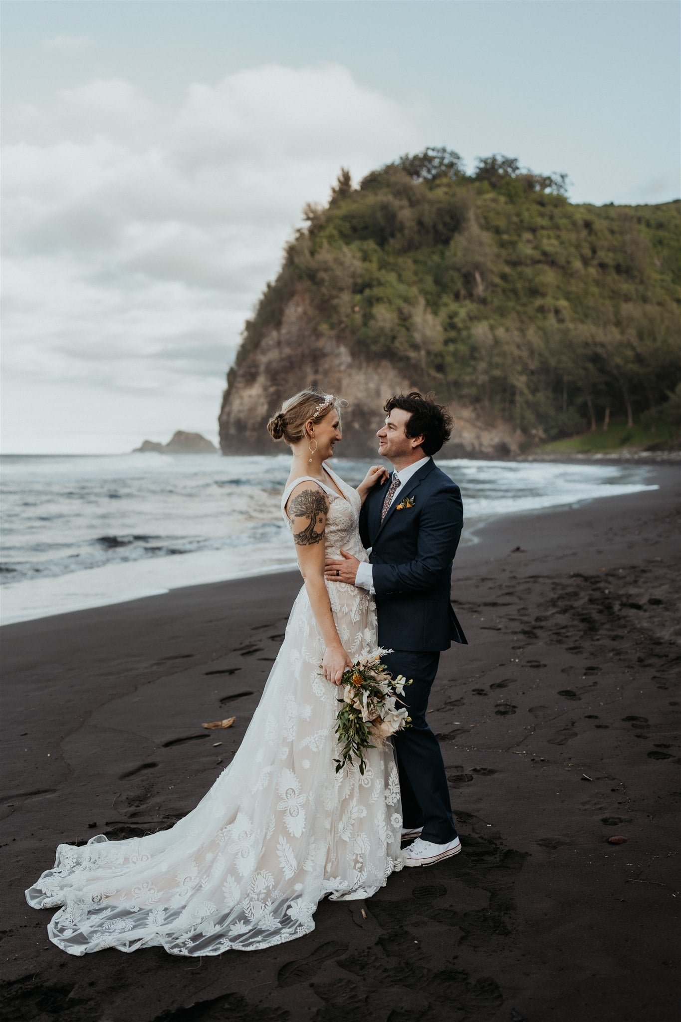 Bride and groom couple portraits on the beach at their Hawaii elopement