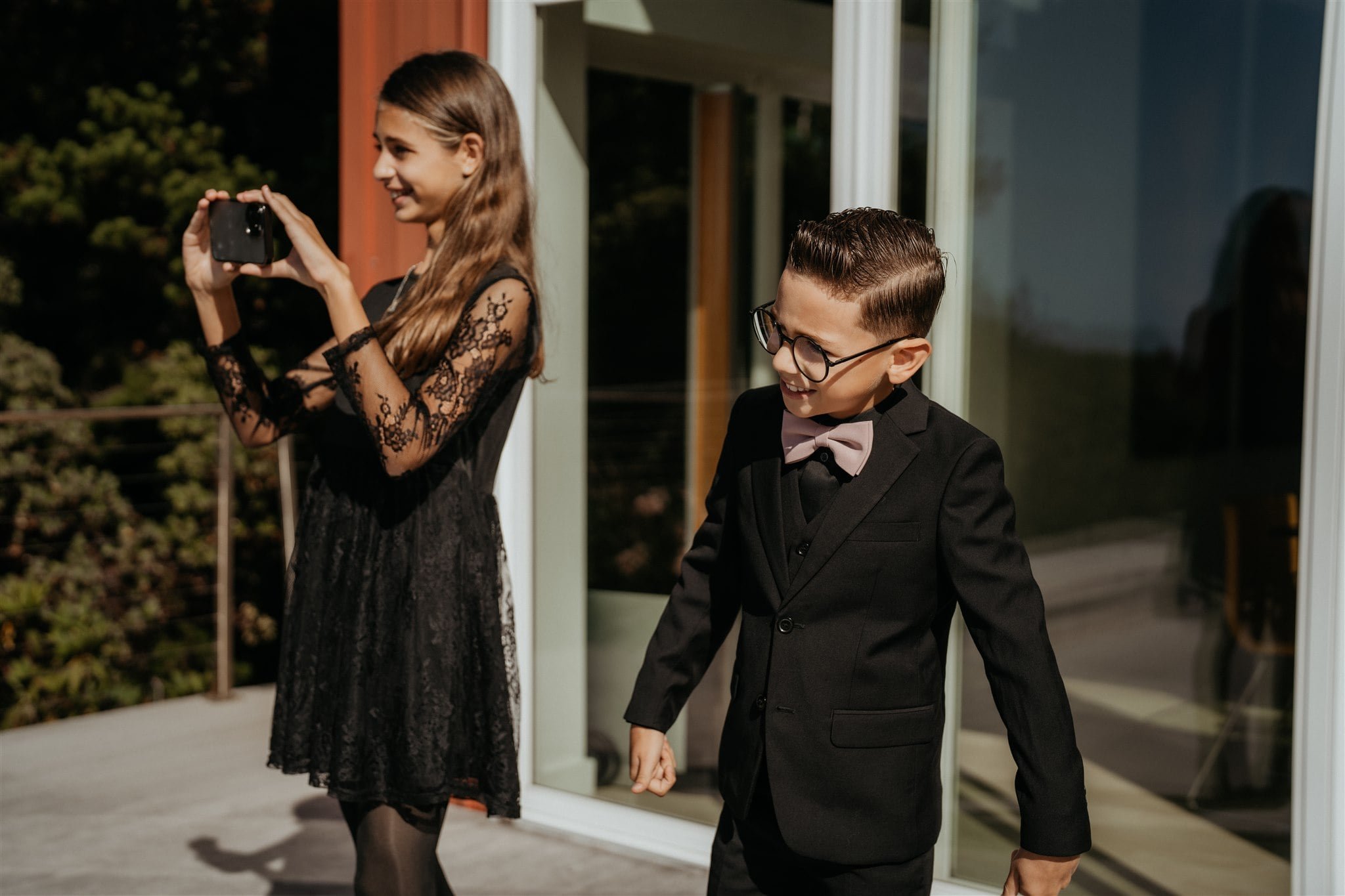 Son and daughter watch two brides do first look at pacific northwest elopement