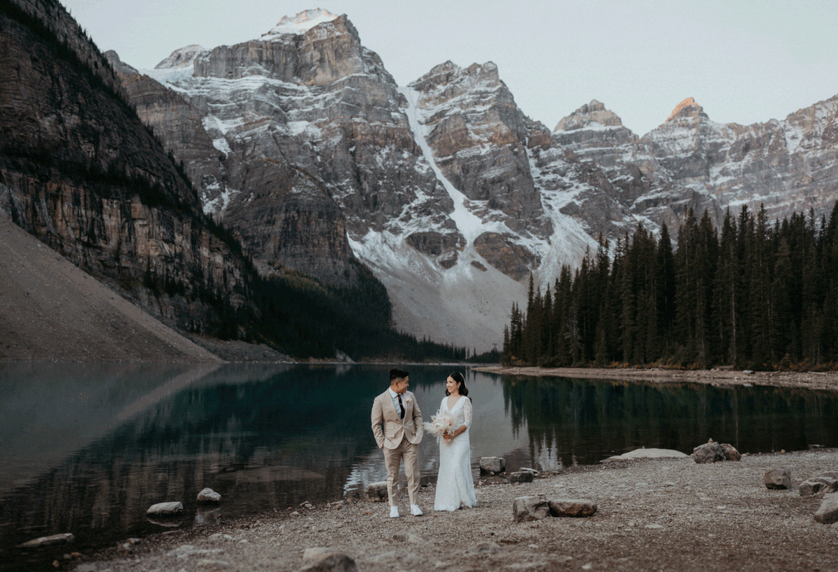Bride and groom first look during sunrise elopement at Banff National Park