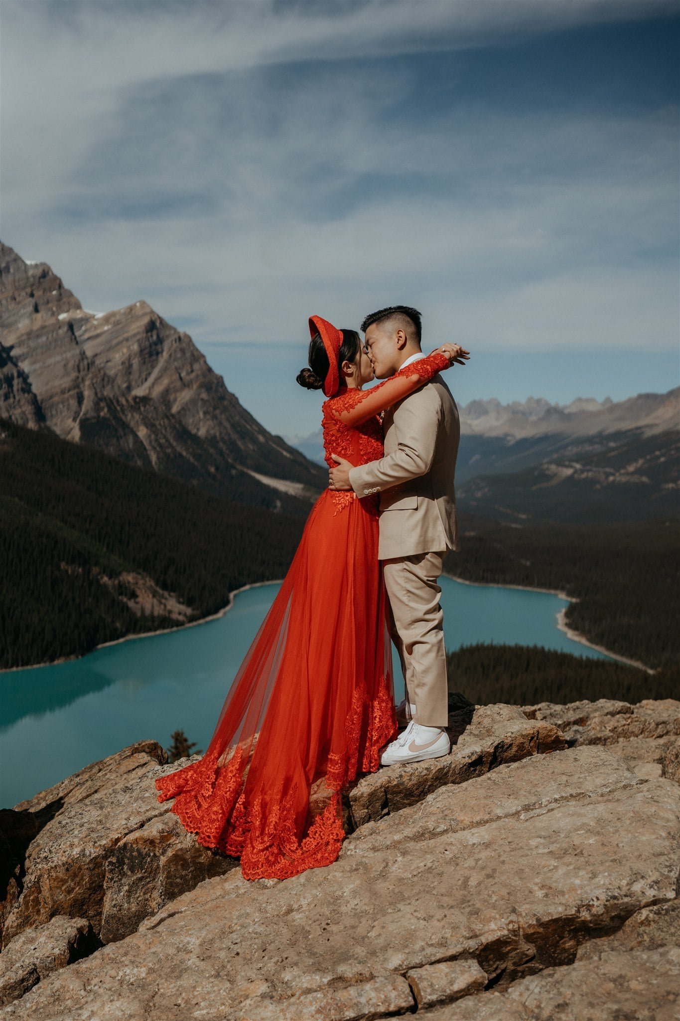 Bride wearing Ao Dai Vietnamese wedding attire during her elopement in Banff National Park