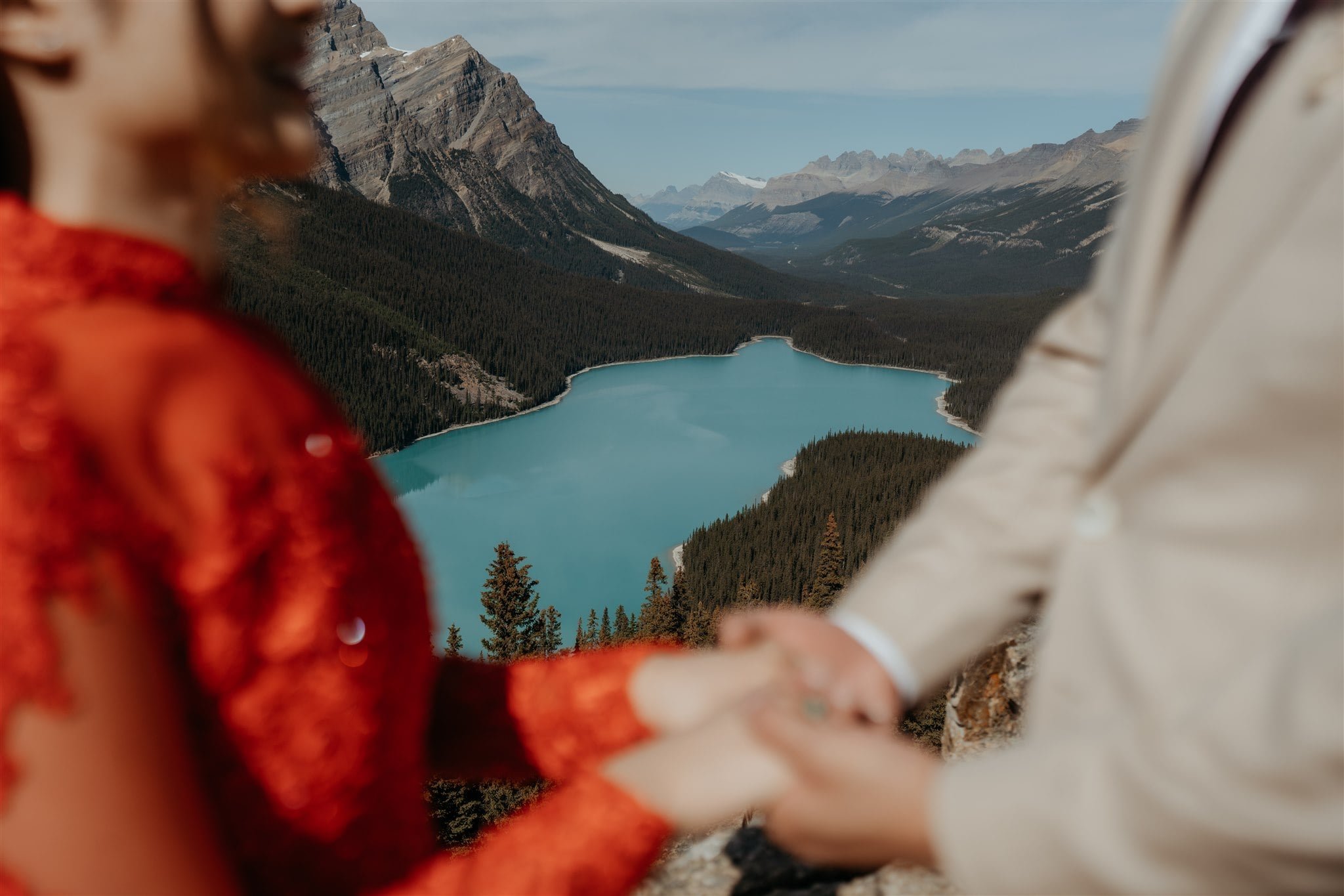 Bride wearing Ao Dai Vietnamese wedding attire during her elopement in Banff National Park