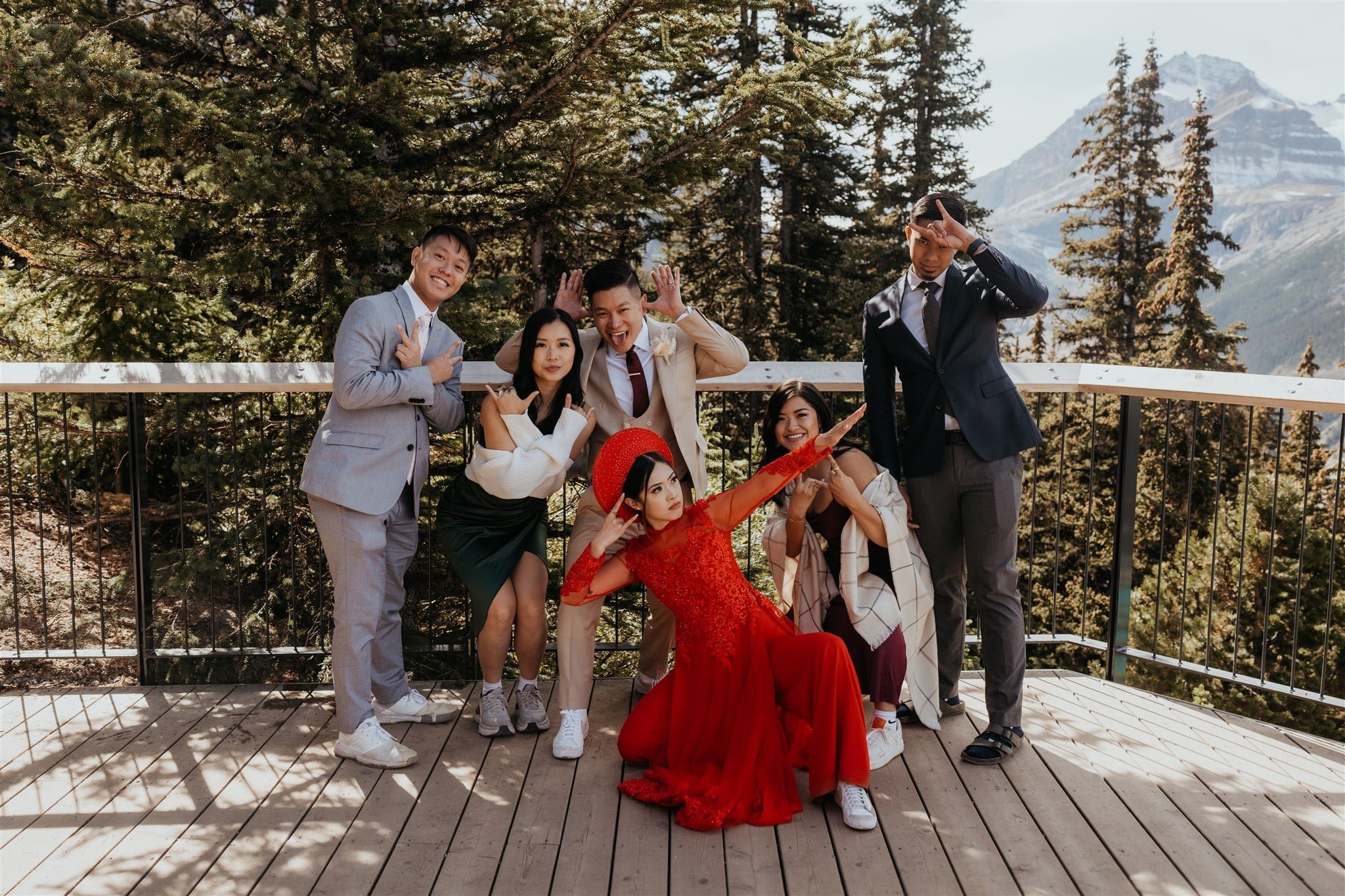 Silly family photos with Ao Dai at Banff National Park elopement
