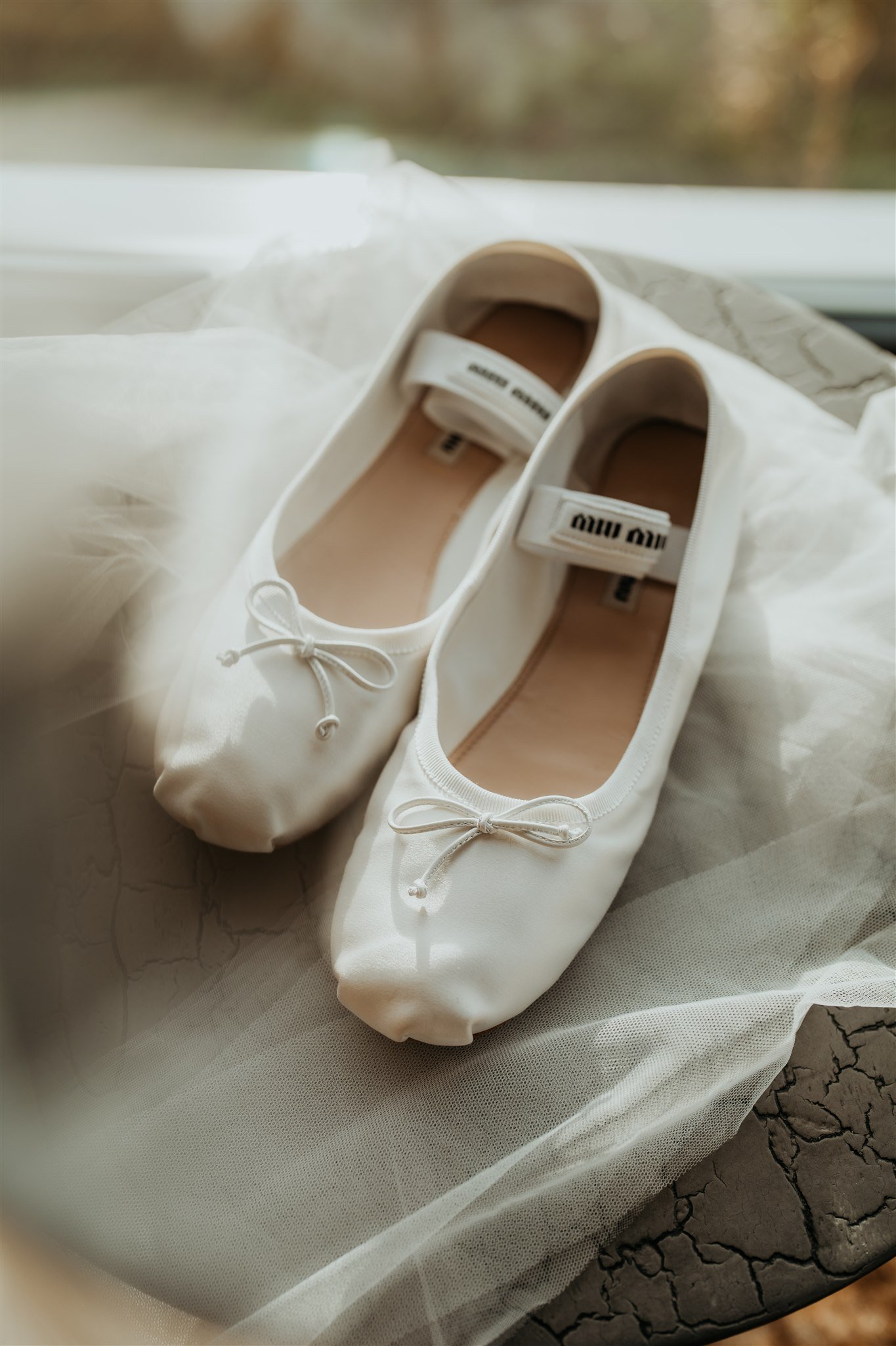 White satin miu miu ballet shoes