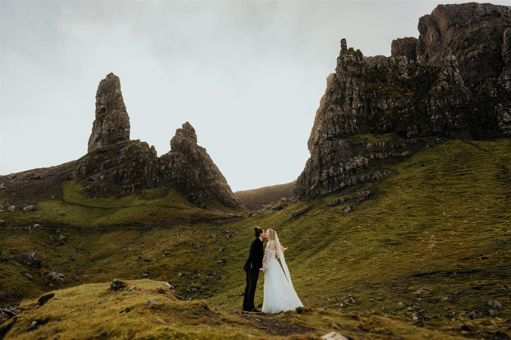 Brides kiss during their Isle of Skye elopement 