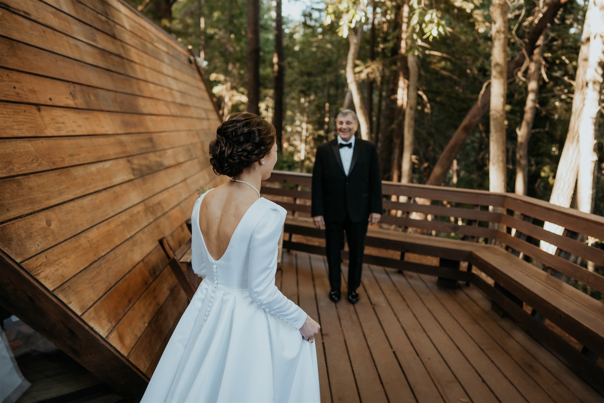 Bride first look with father at Sequoia Retreat Center