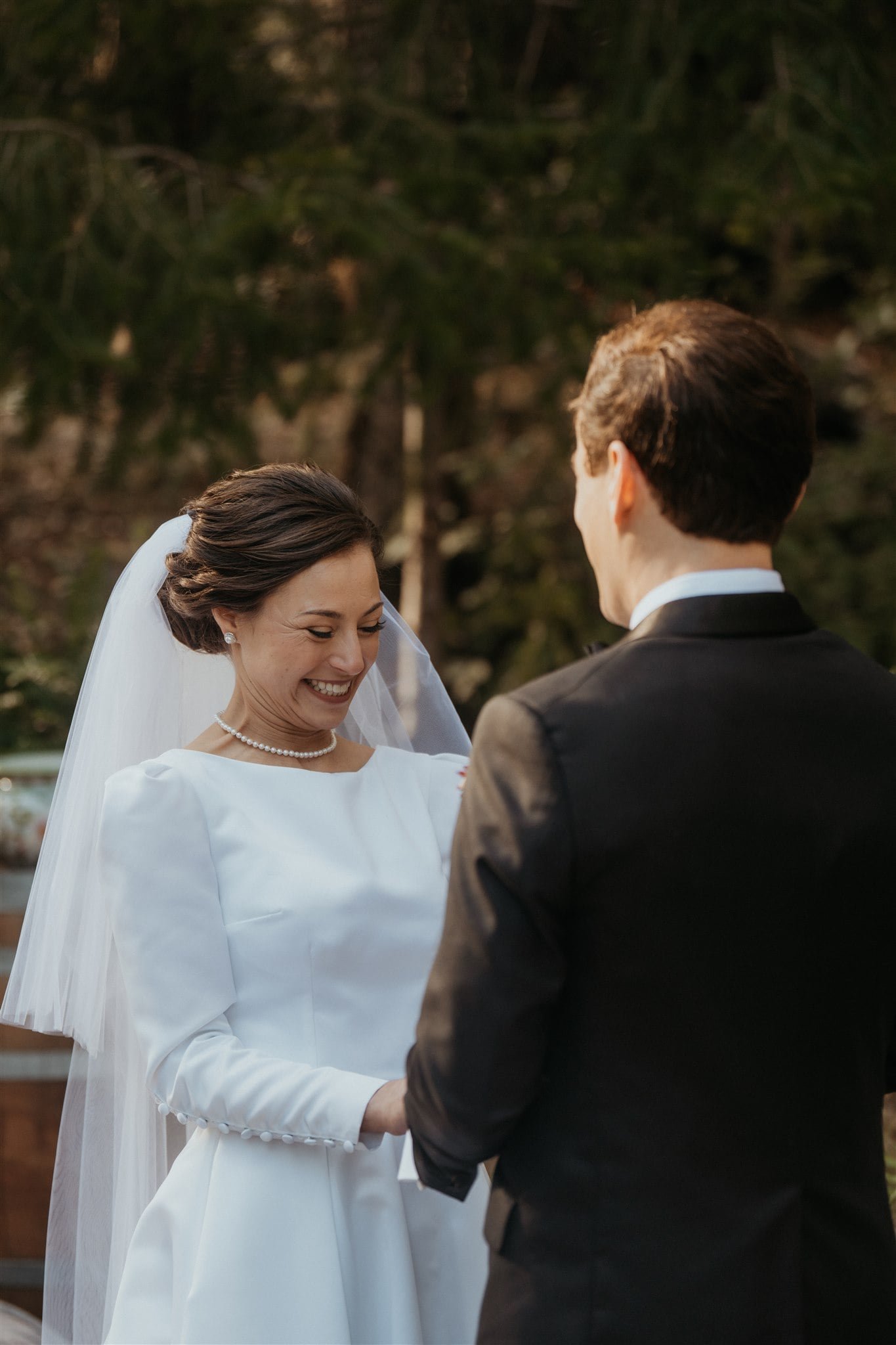 Bride laughs during California micro wedding ceremony