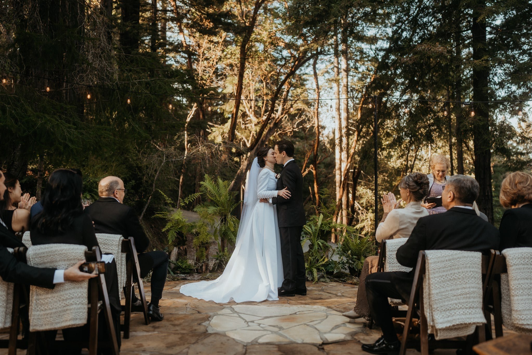 Bride and groom kiss at California micro wedding ceremony