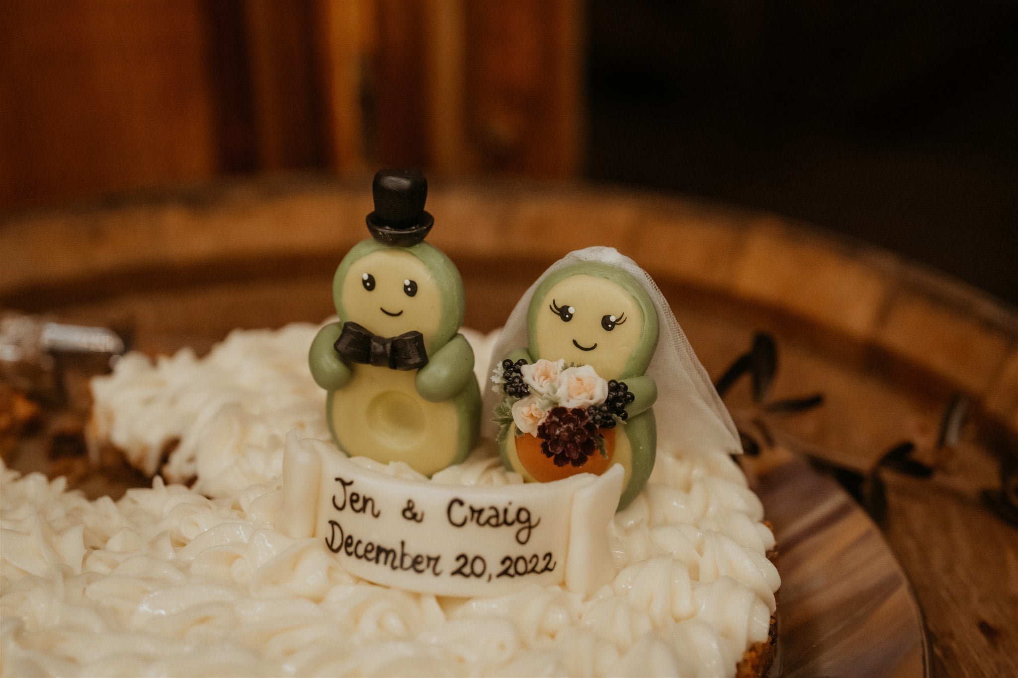 Bride and groom avocado cake toppers 