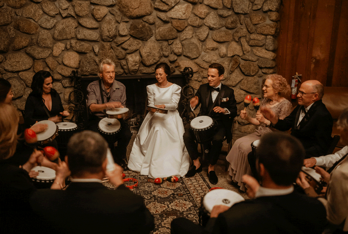 Bride and groom drum with guests at California micro wedding 