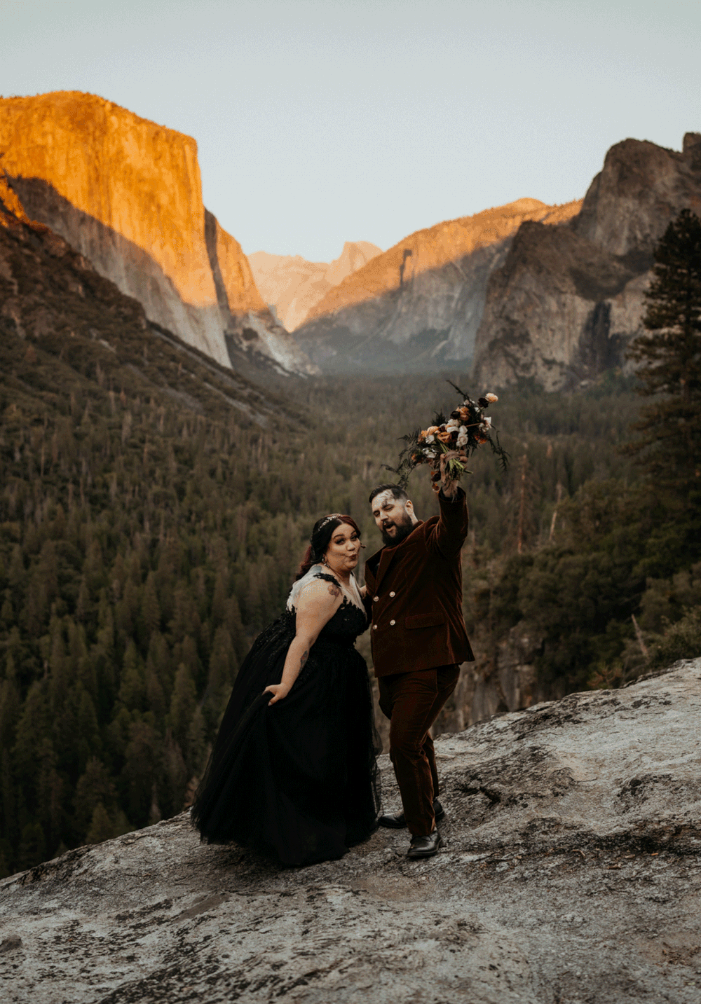 Bride and groom dance at their sunset Yosemite elopement at Tunnel View