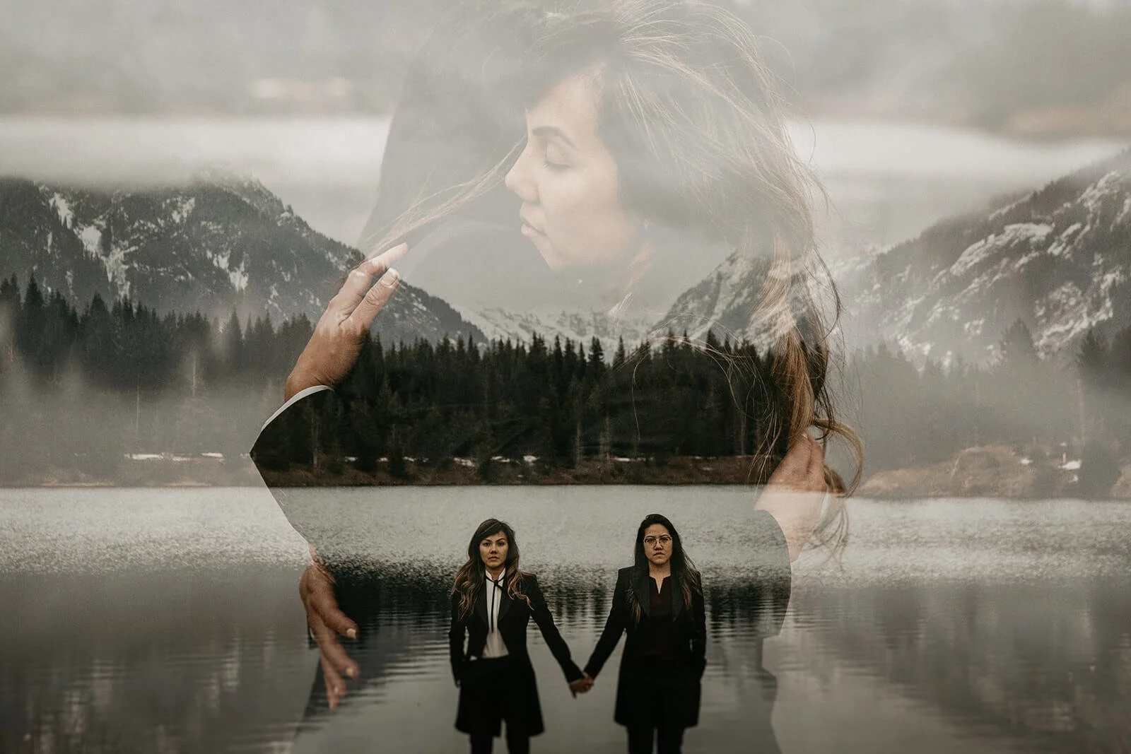 Two women hug at Snoqualmie Pass during their engagement photo session