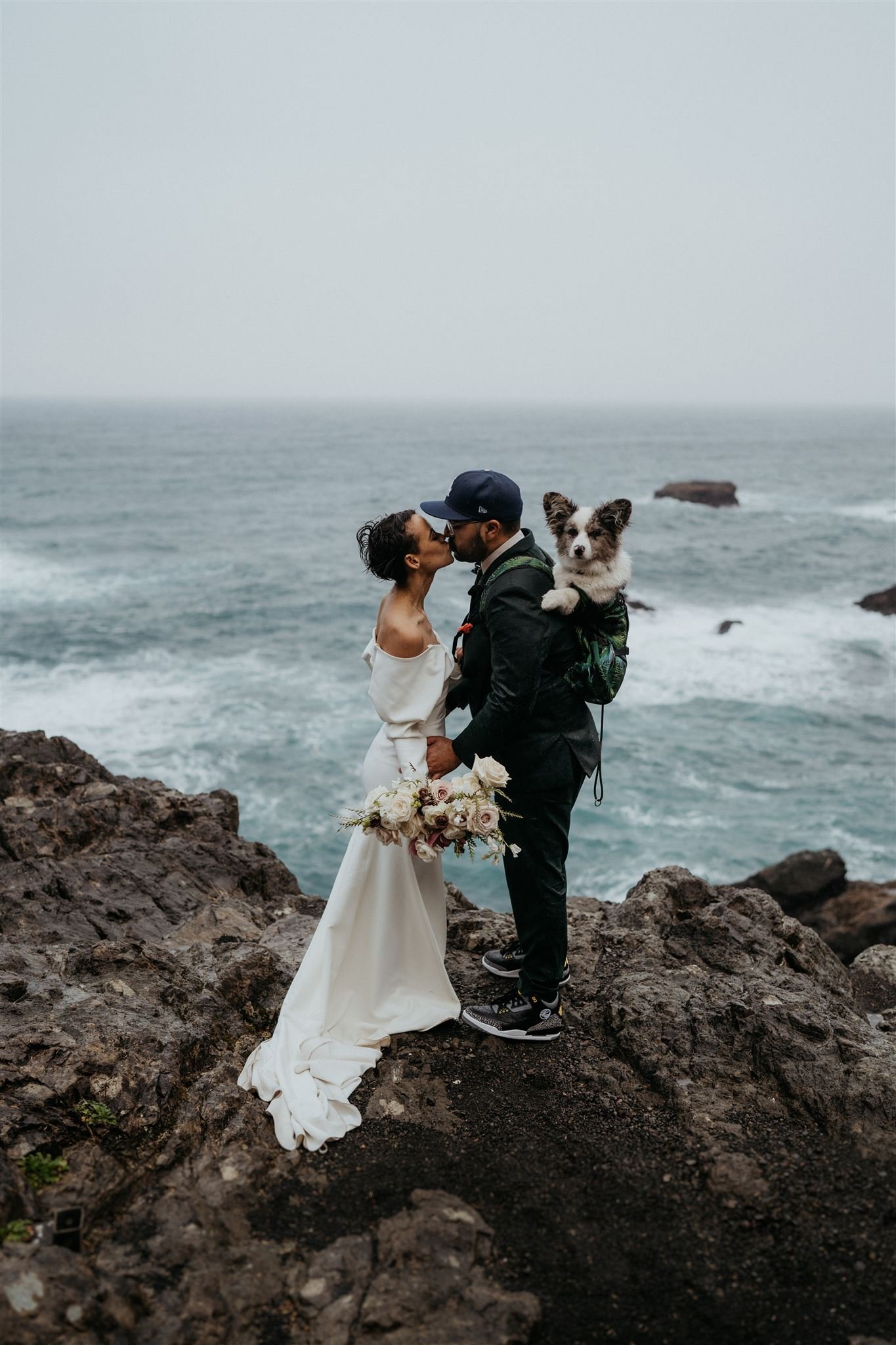 Bride and groom kissing on the Oregon Coast
