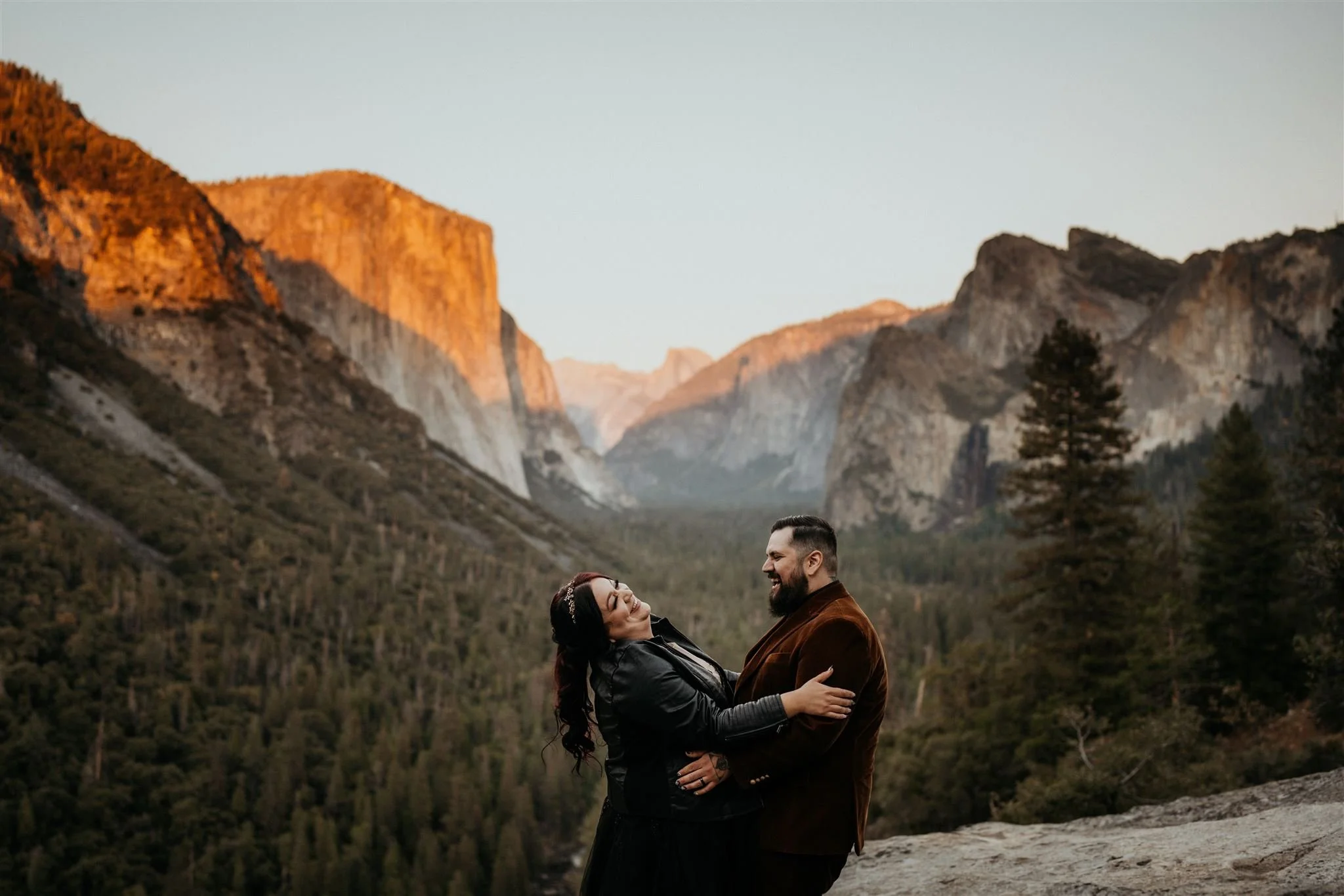 Couple laughing during their Yosemite elopement photos at sunset