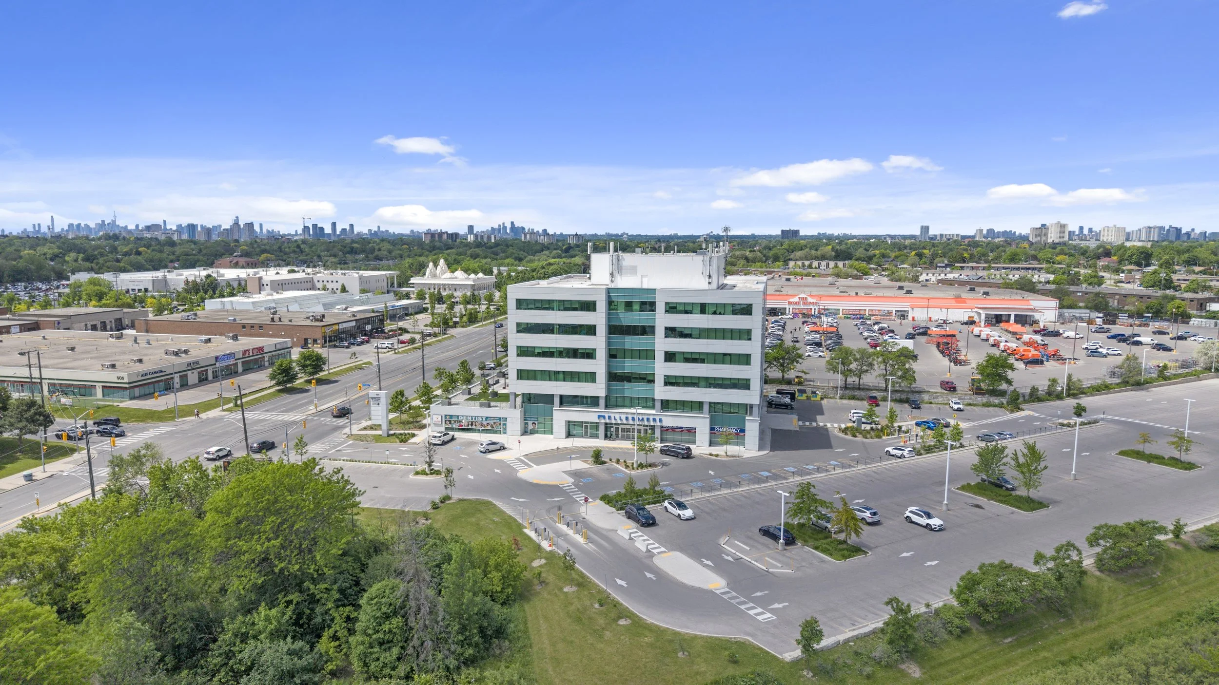 Aerial view of a Toronto property showing the building and surrounding and surrounding neighbourhood