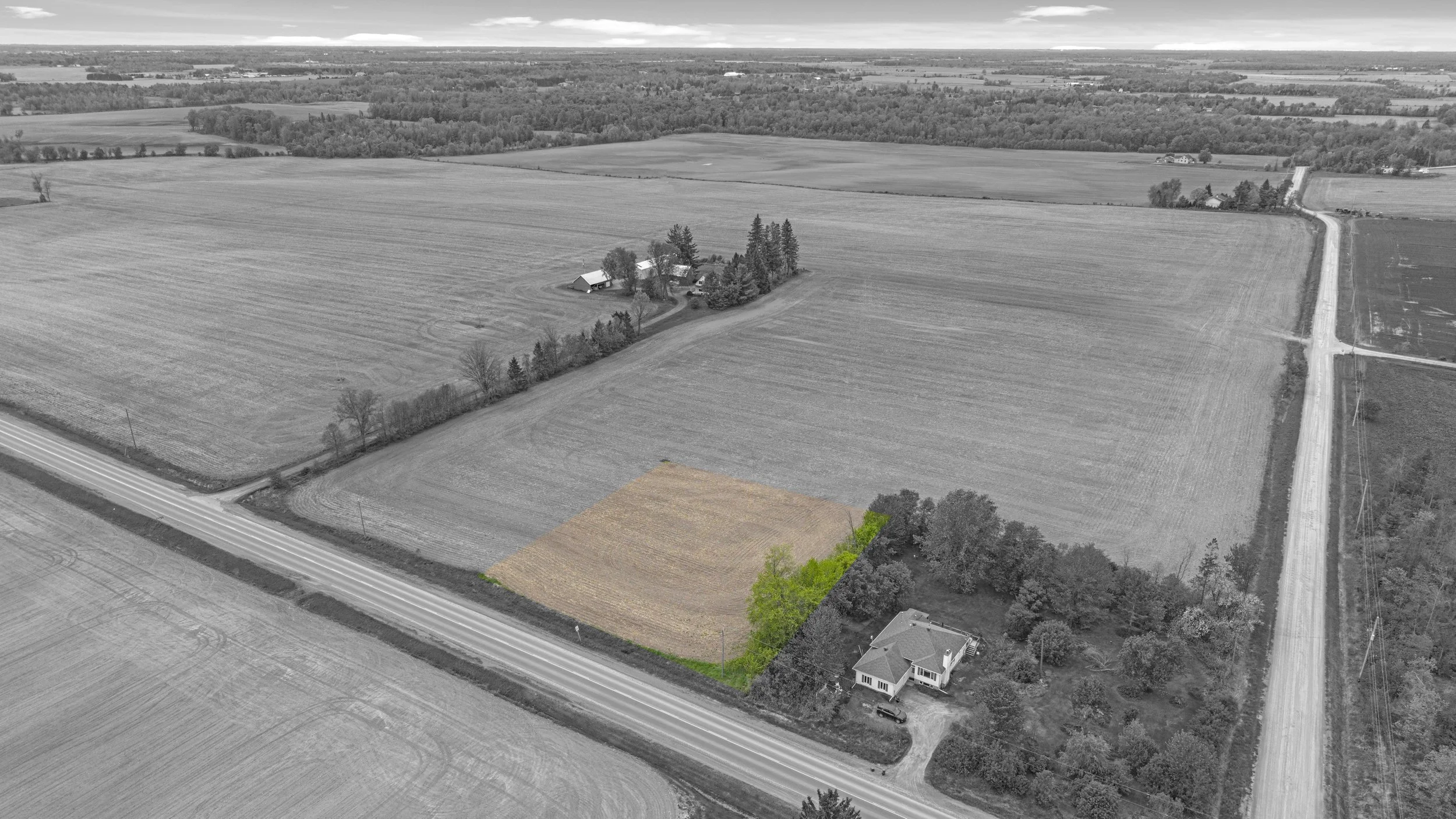 Overhead drone view of a residential property and surrounding landscape in Ottawa