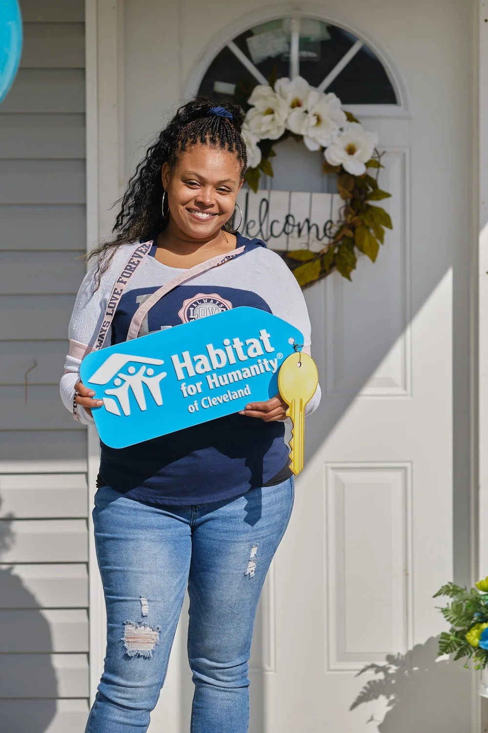 Proud mom and her four children start new lives in Habitat for Humanity home