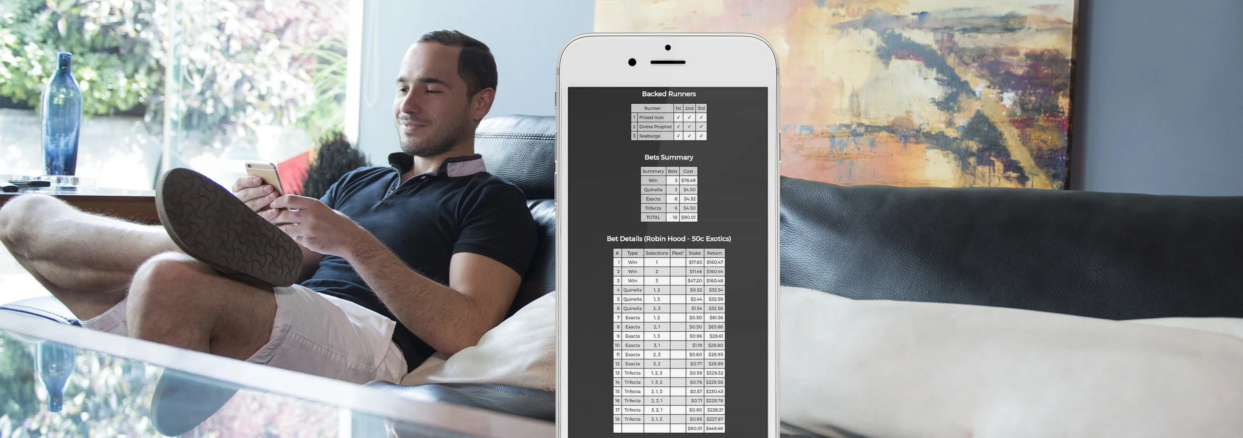 placeit MQ guy on couch robin hood iphone.jpg