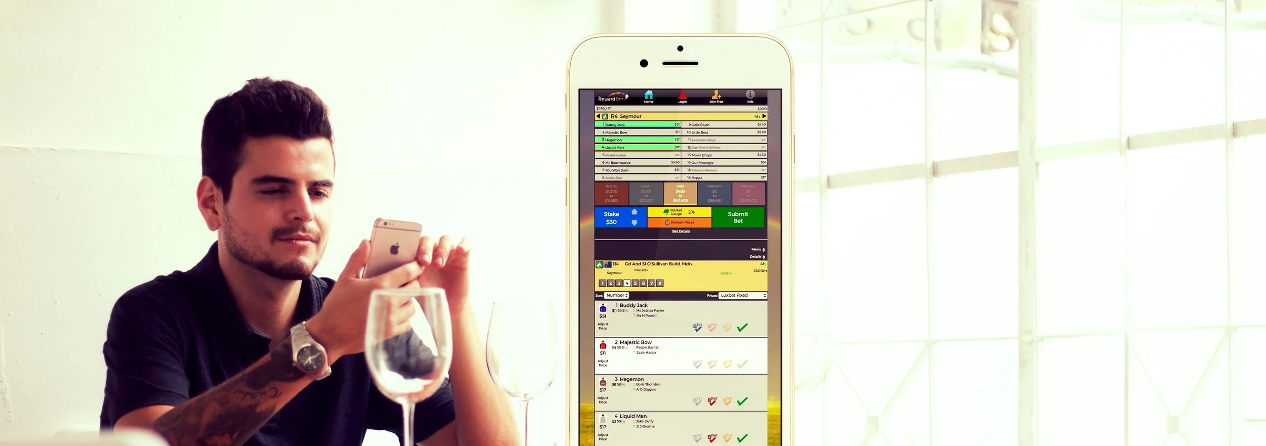 MQ placeit-landscape guy at table with iphone.jpg