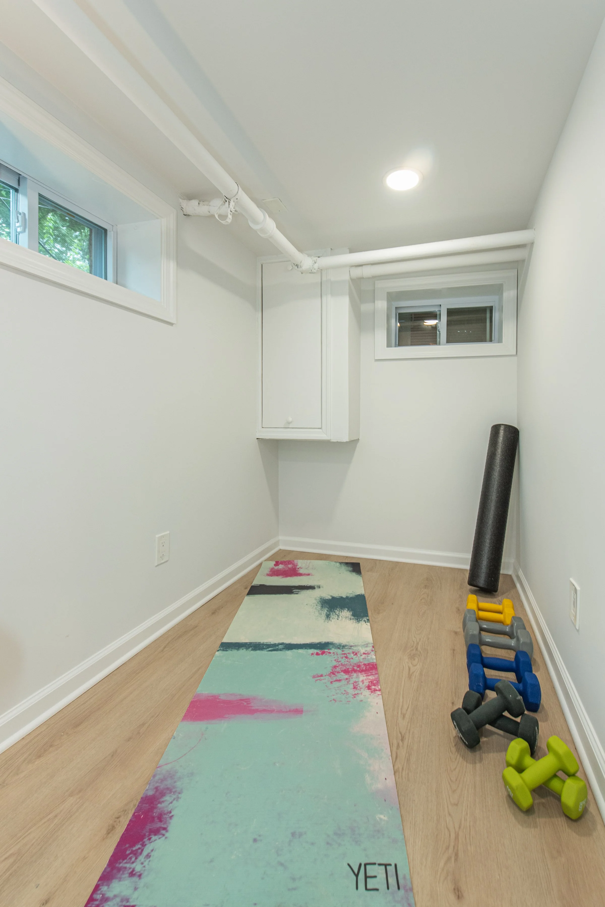 28 Finished basement gym area.jpg