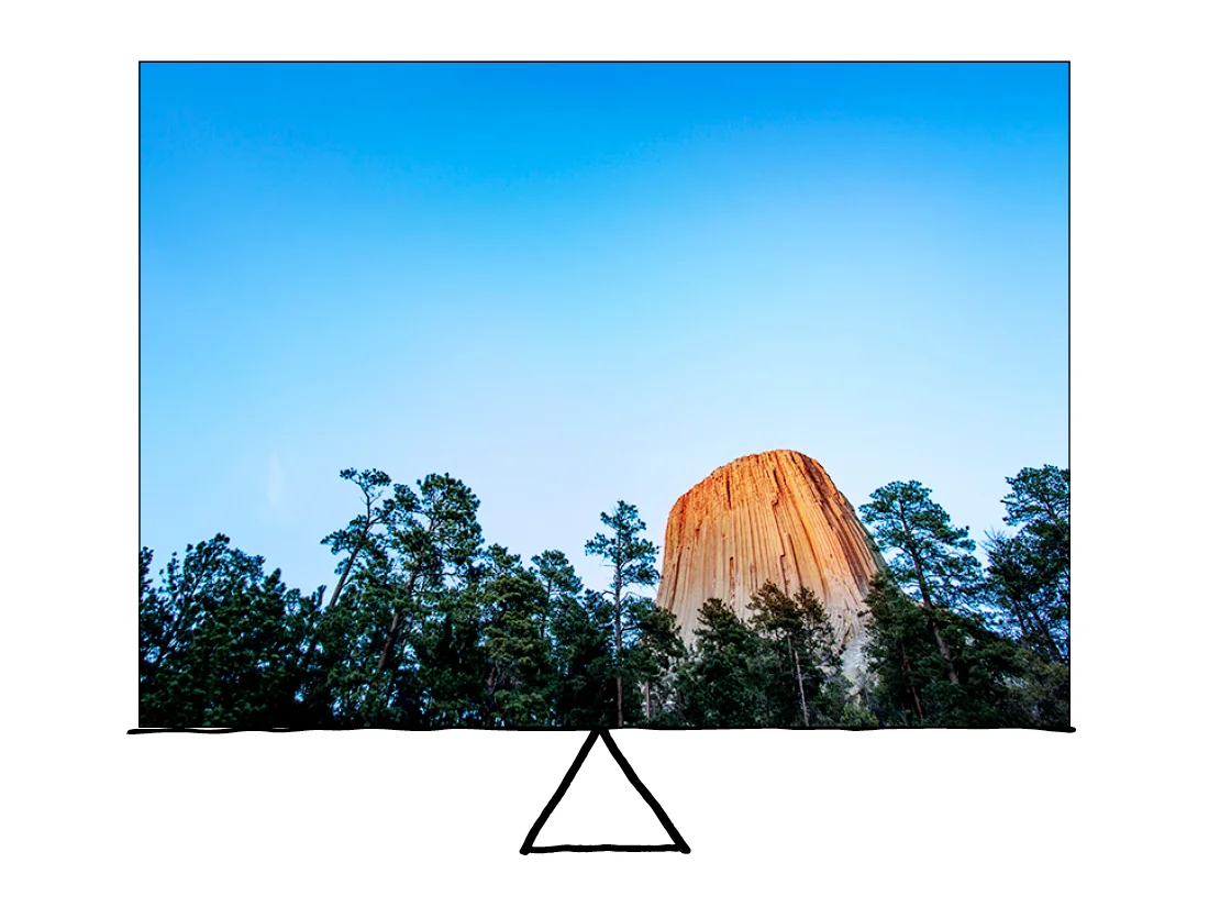Devil’s Tower is the focus because of color and texture, but it’s balanced by the sky. The colors changed from a light gray during the day to an almost blood red during sunset. There's still debate on how this thing actually formed. You can read more about it here , but I think Spielberg was on to something... 
