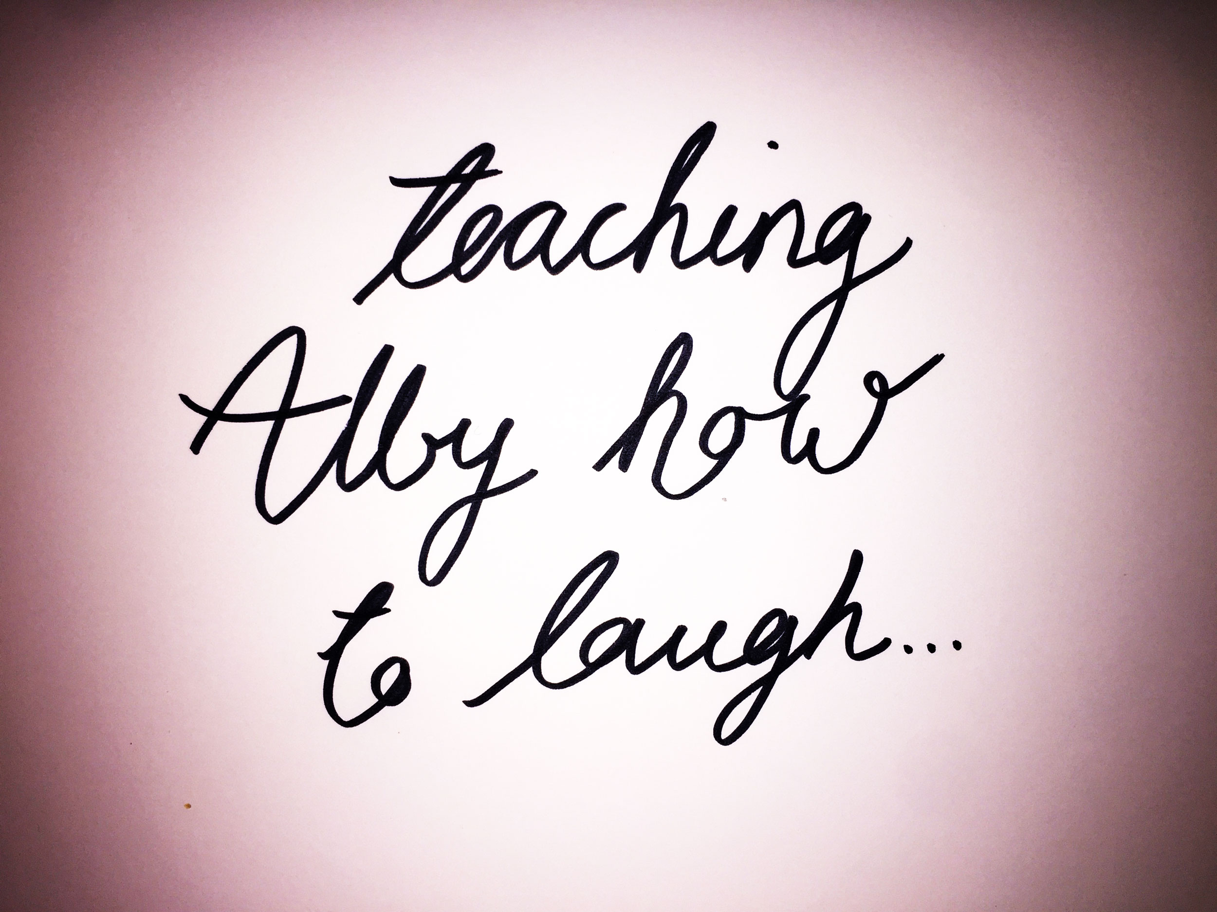 Teaching Alby how to laugh. Drawing Luke Hockley.