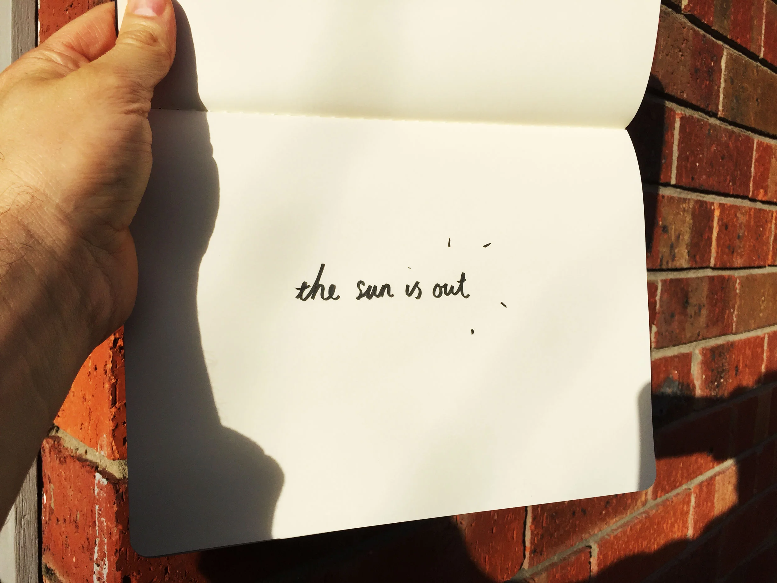 The sun is out. Drawing Luke Hockley.