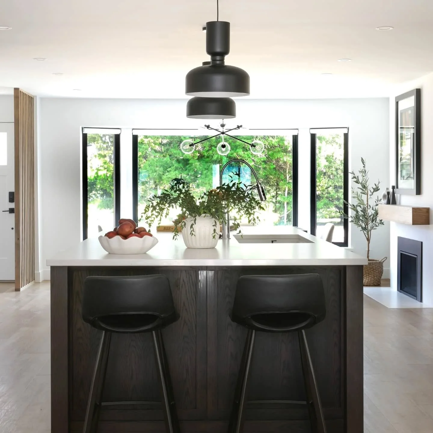 ✨ Sophisticated Simplicity, Thoughtfully Designed ✨
This full home renovation was all about elevating everyday living through timeless details and intentional choices.⁠
⁠
We layered warm oak flooring with rich custom-stained millwork, paired it with 