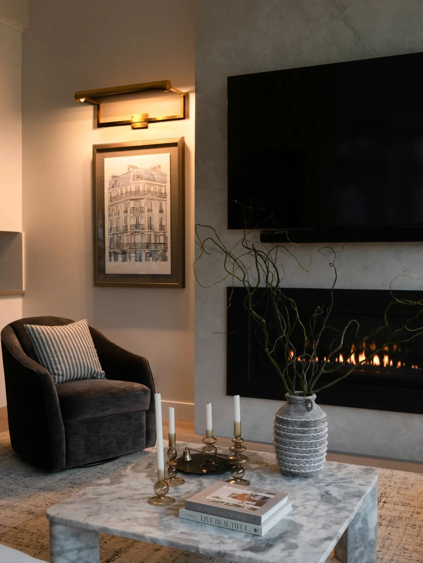 Loving how this North Vancouver living room came together. ✨
We kept everything soft and cozy with layered neutrals, a custom marble coffee table, and those super-comfy swivel chairs. The fireplace wall adds just the right amount of drama, and the br