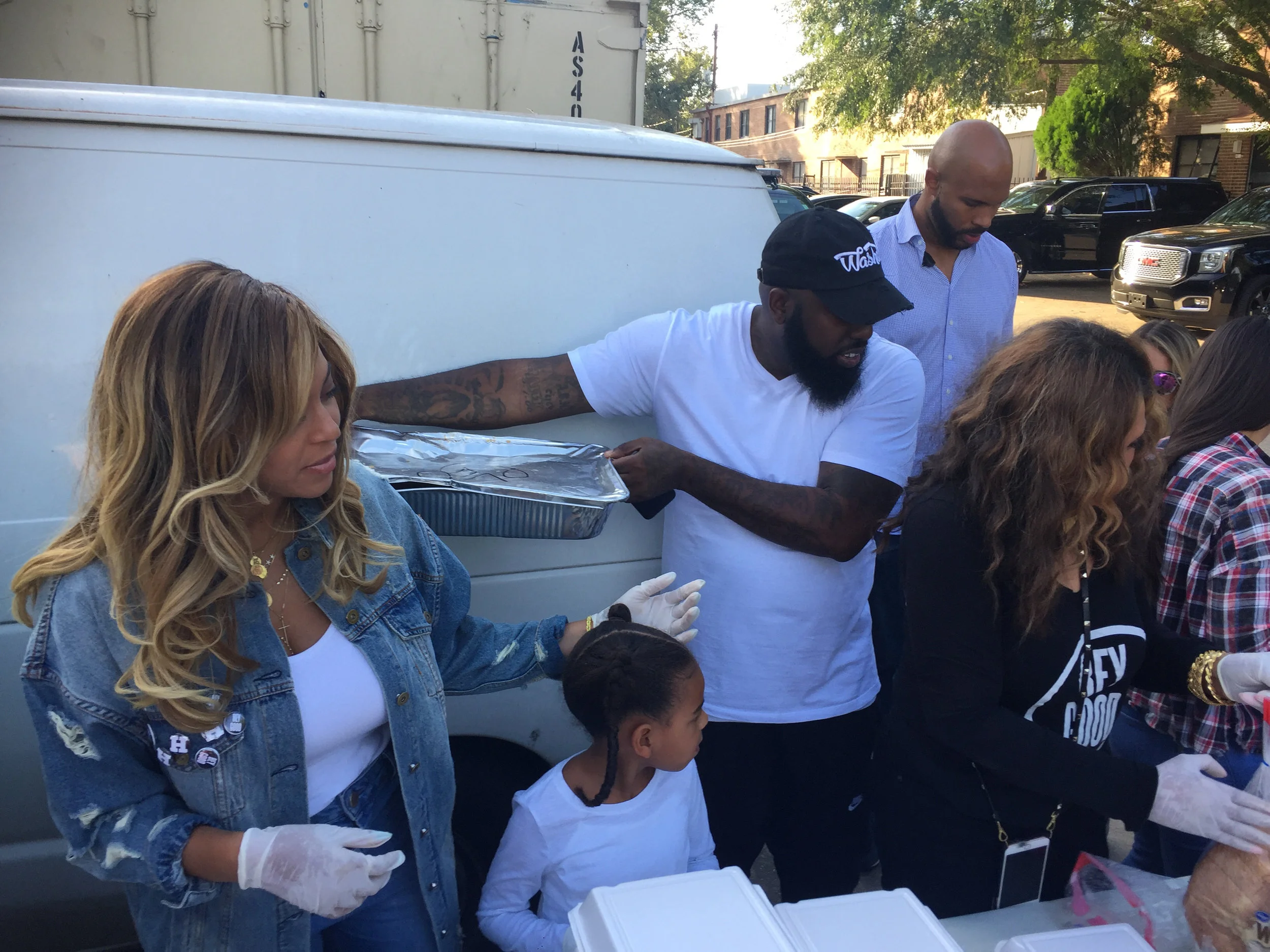 Trae Tha Truth feeding families in need with Beyonce in Houston following Hurricane Harvey. Photo via ABC13