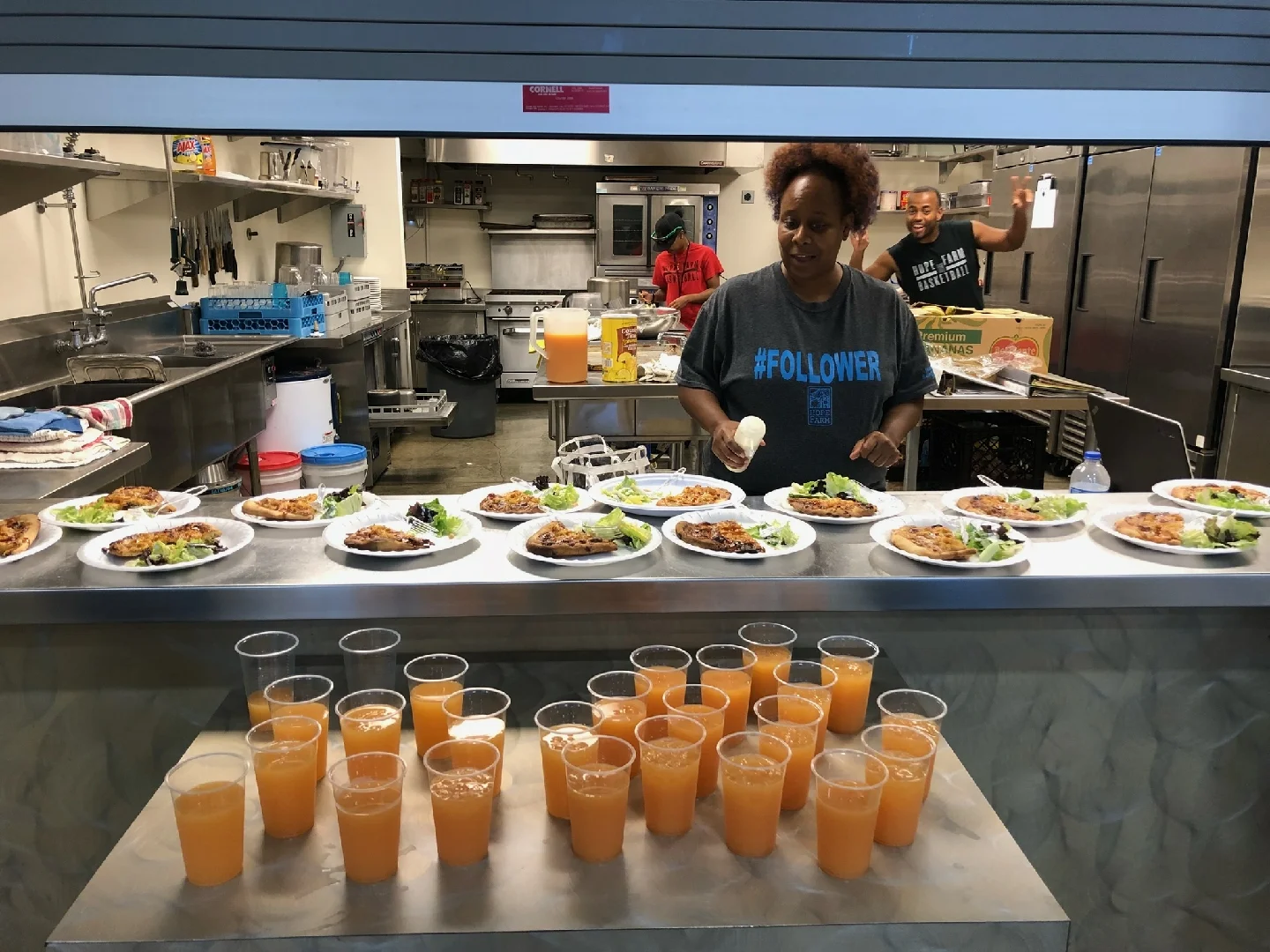 Chef AJ preparing plates for an event. Courtesy photo