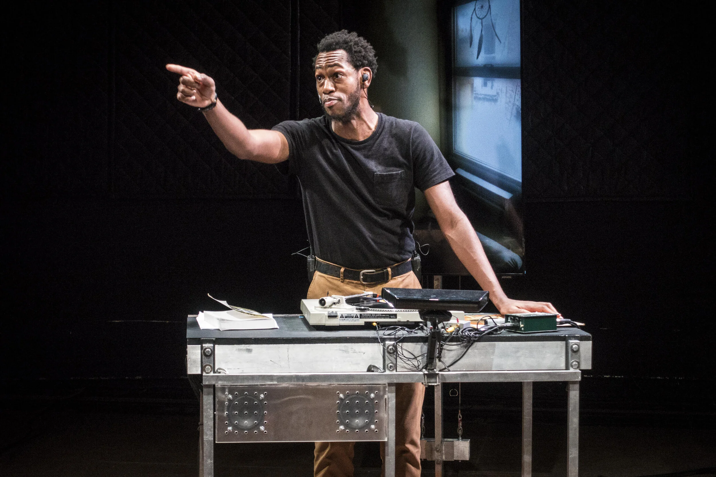 Eric Berryman in The Wooster Group's THE B-SIDE: “Negro Folklore From Texas State Prisons” A Record Album Interpretation. Photo by Bruce Jackson