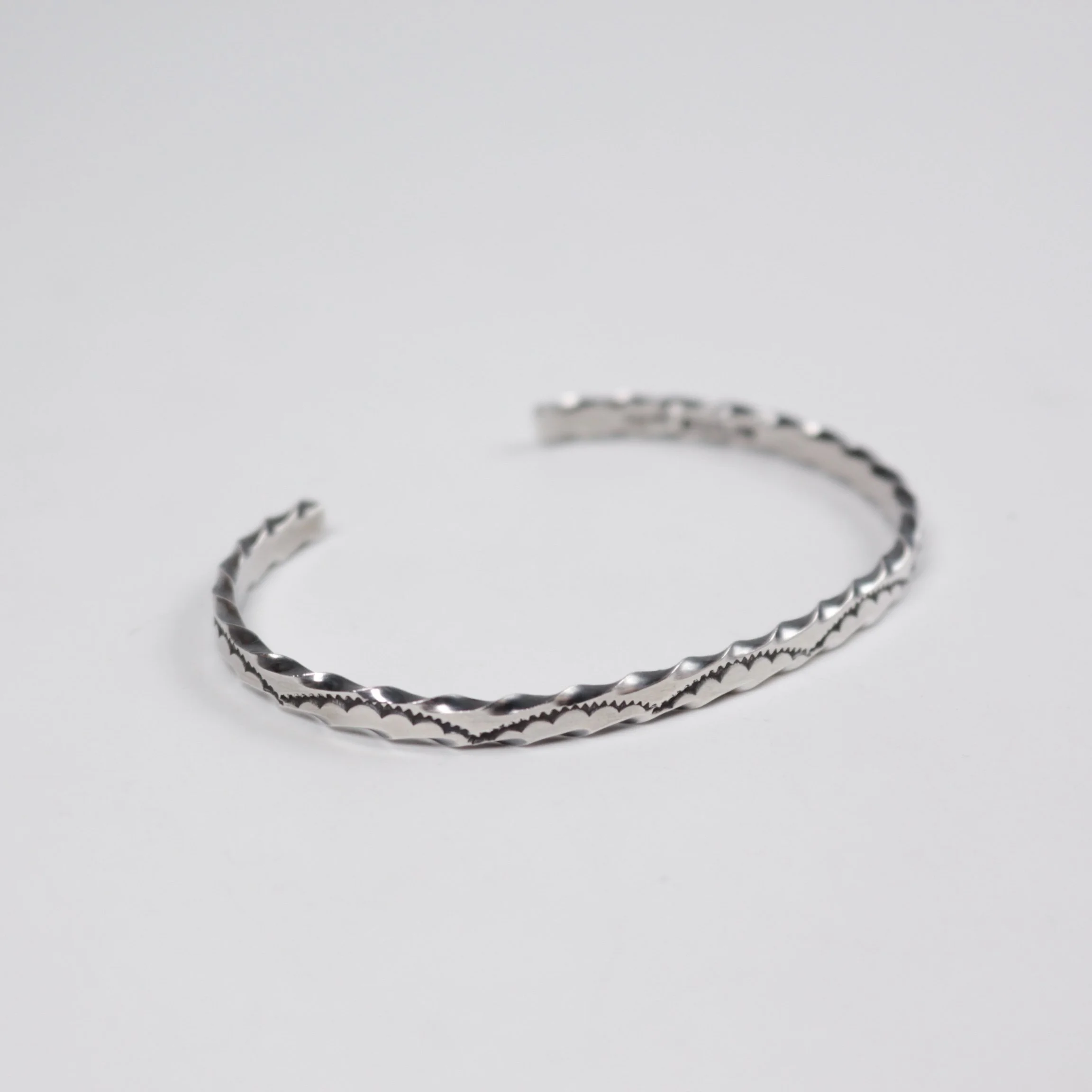 Stamped Twisted Navajo Cuff