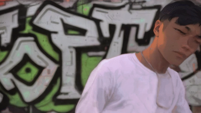 asian-young-man-dancing-breakdance-in-the-street-2021-10-21-03-09-28-utc 2.gif