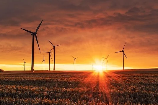 800px-Wind_turbines_at_sunrise_edit.jpg