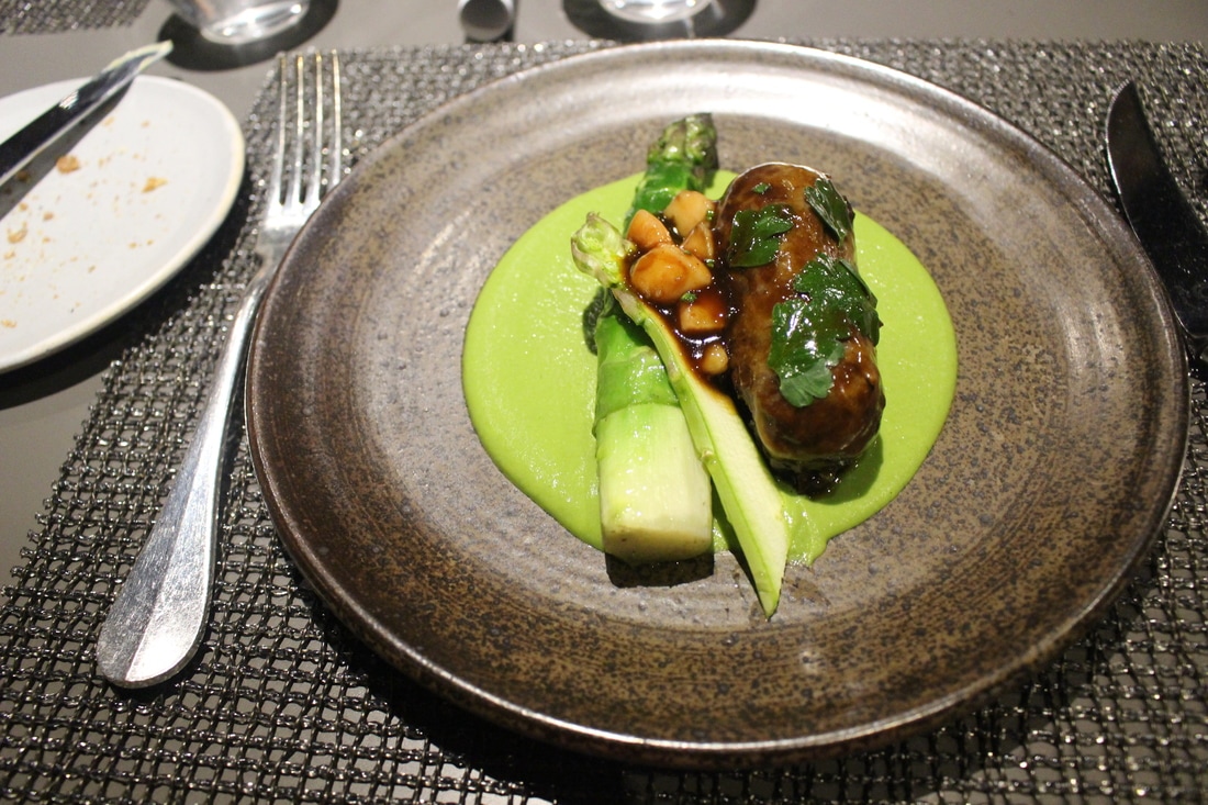 That's bone marrow between the beef and asparagus.