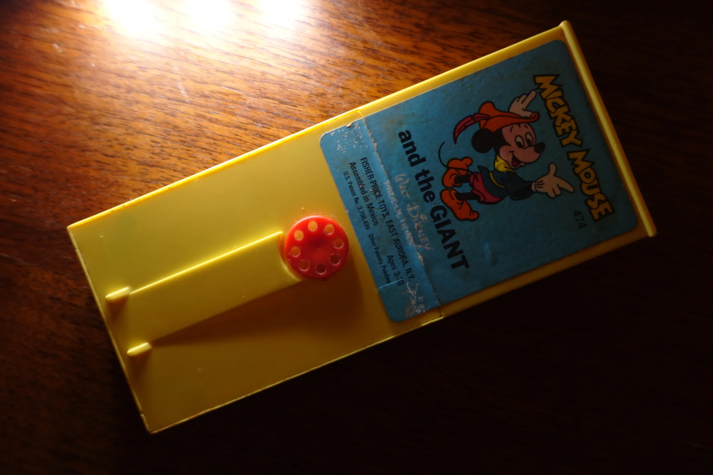  Fisher Price Movie Viewer Cartridge with film removed. The cartridges hold around 12 feet which is around 2m30s at 18fps. 